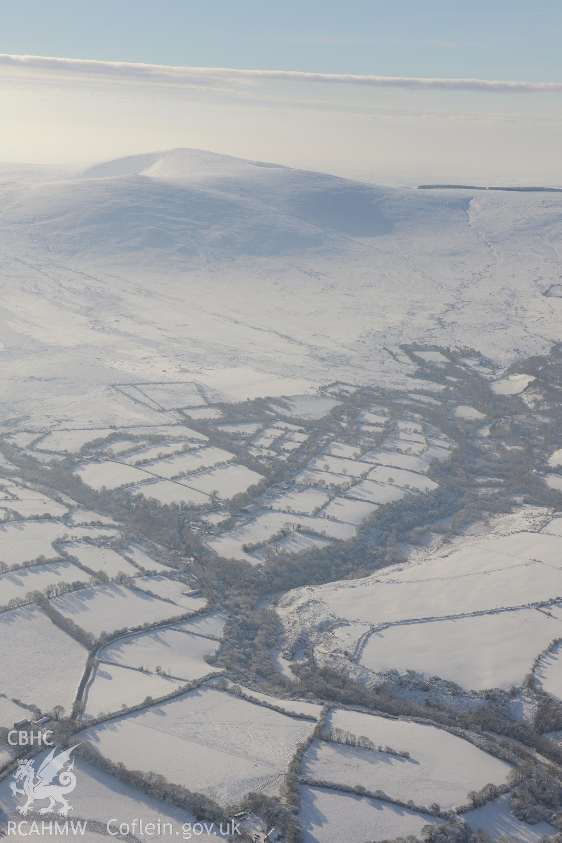 Craig Rhosyfelin bluestone outcrop, south west of Cardigan. Oblique aerial photograph taken during the Royal Commission?s programme of archaeological aerial reconnaissance by Toby Driver on 24th January 2013.