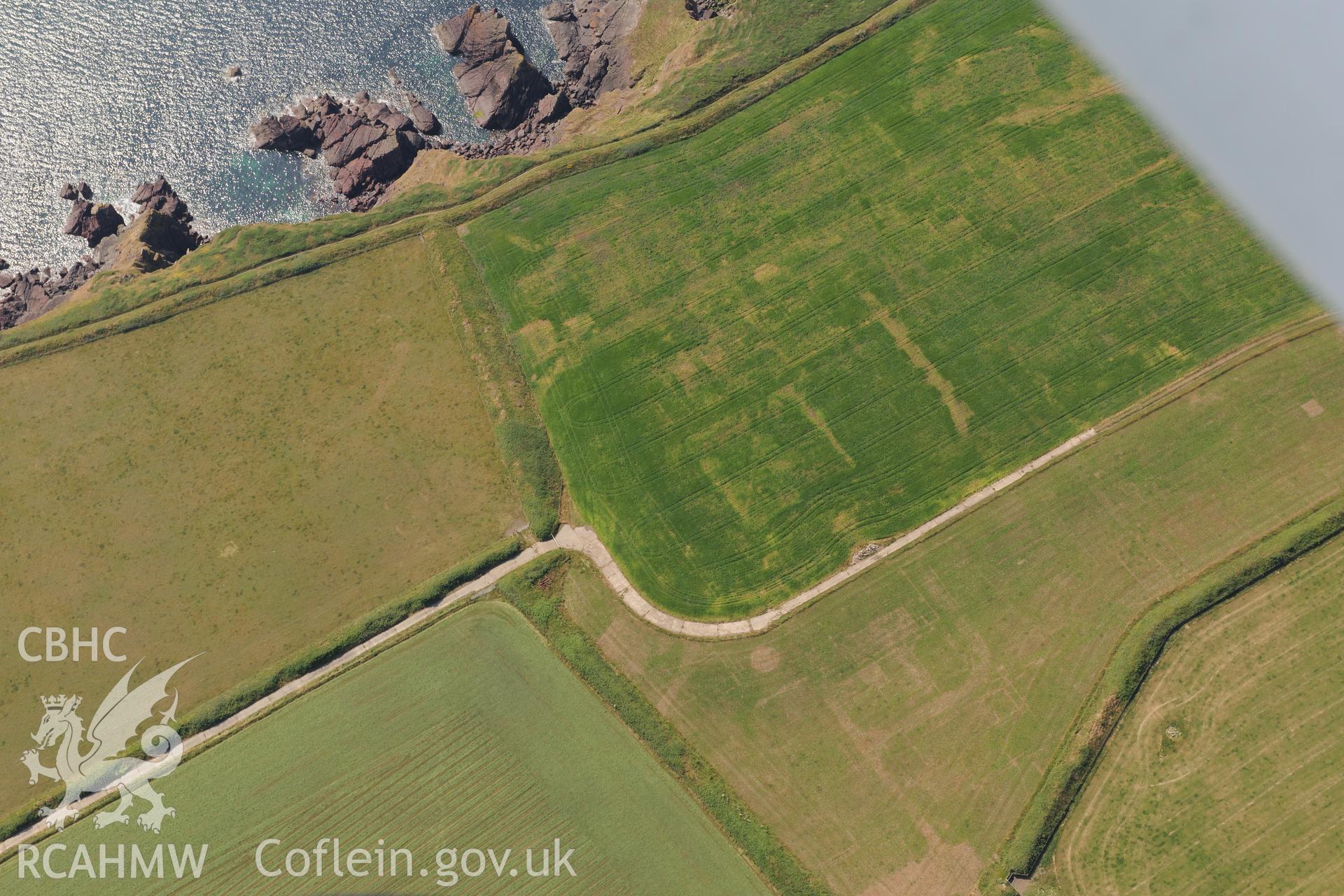 Site of the old Second World War Base the HMS Harrier, with site of associated chapel, Dale. Oblique aerial photograph taken during the Royal Commission?s programme of archaeological aerial reconnaissance by Toby Driver on 16th July 2013.