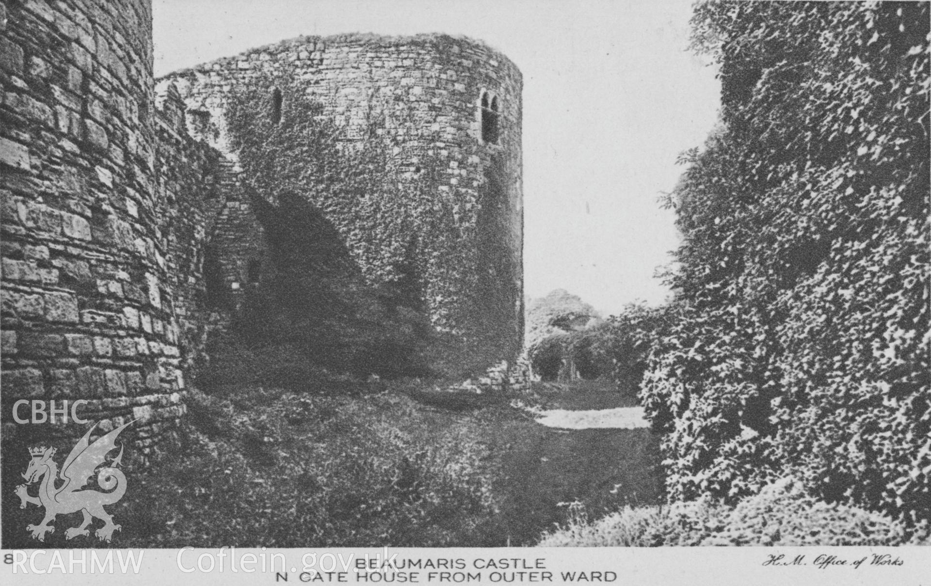 Digital copy of a postcard showing the north gate of Beaumaris Castle.