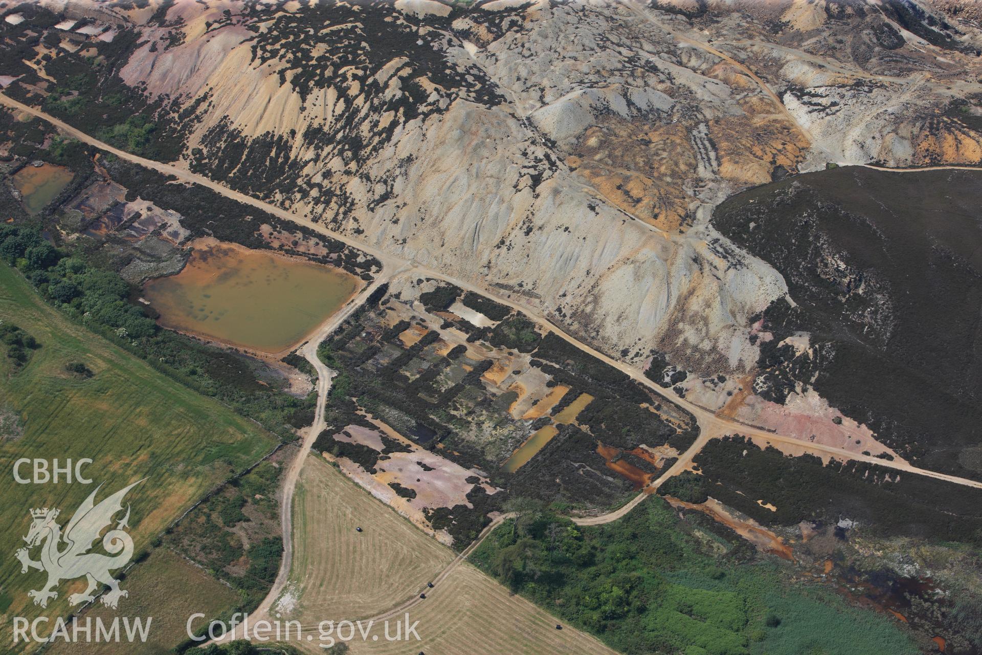 Parys Mountain copper mines, Amlwch, Anglesey. Oblique aerial photograph taken during the Royal Commission?s programme of archaeological aerial reconnaissance by Toby Driver on 12th July 2013.