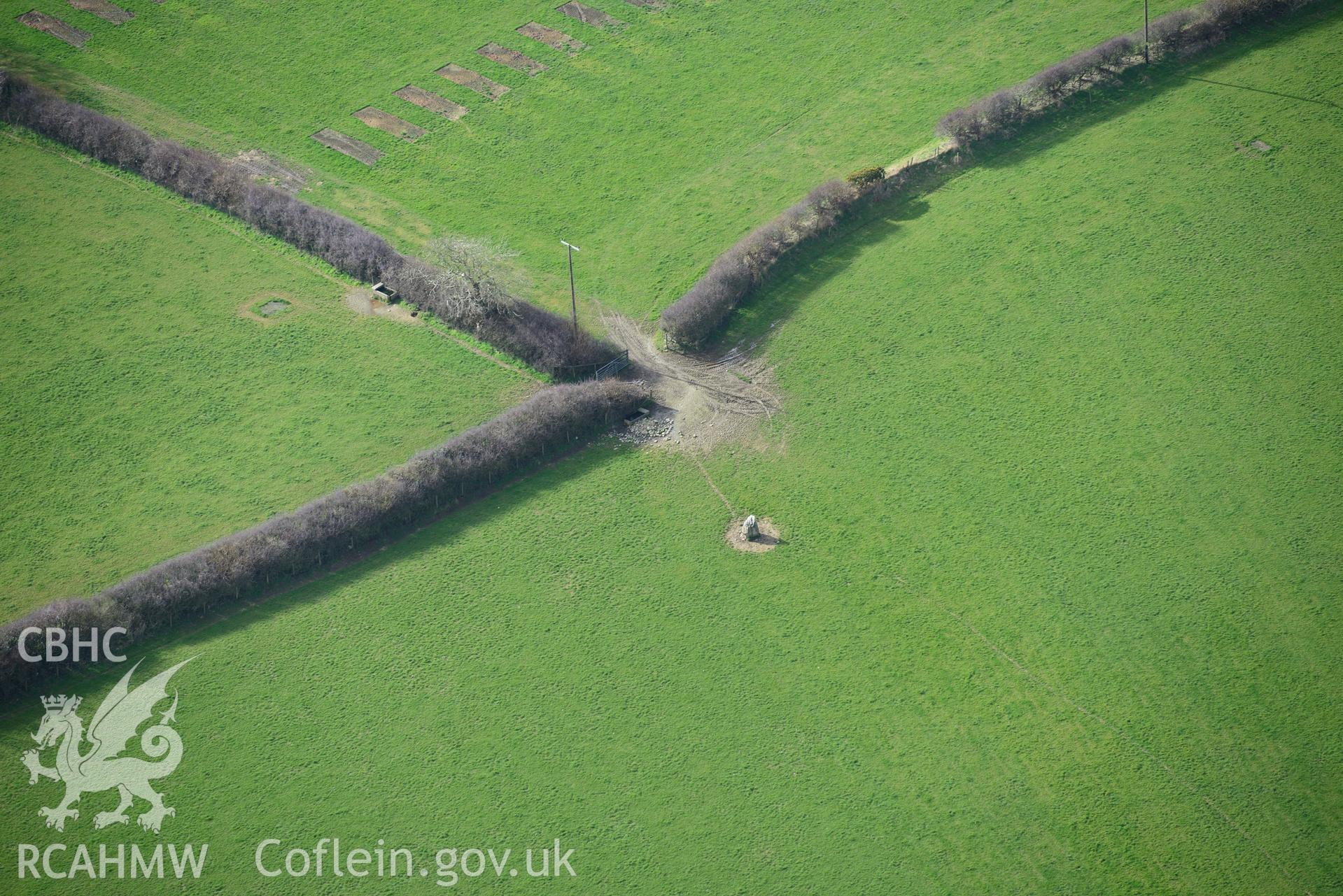 Parc-y-Garreg standing stone, Trefaes Maenhir, near Cardigan. Oblique aerial photograph taken during the Royal Commission's programme of archaeological aerial reconnaissance by Toby Driver on 13th March 2015.