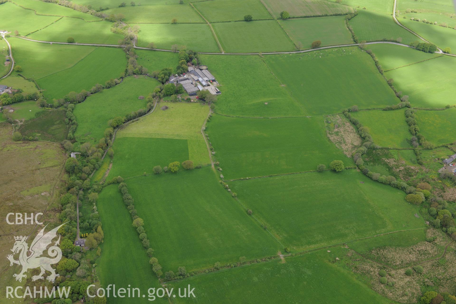 Old Abbey farm and the site of Hen Fynachlog, Ystrad Fflur. Oblique aerial photograph taken during the Royal Commission's programme of archaeological aerial reconnaissance by Toby Driver on 3rd June 2015.