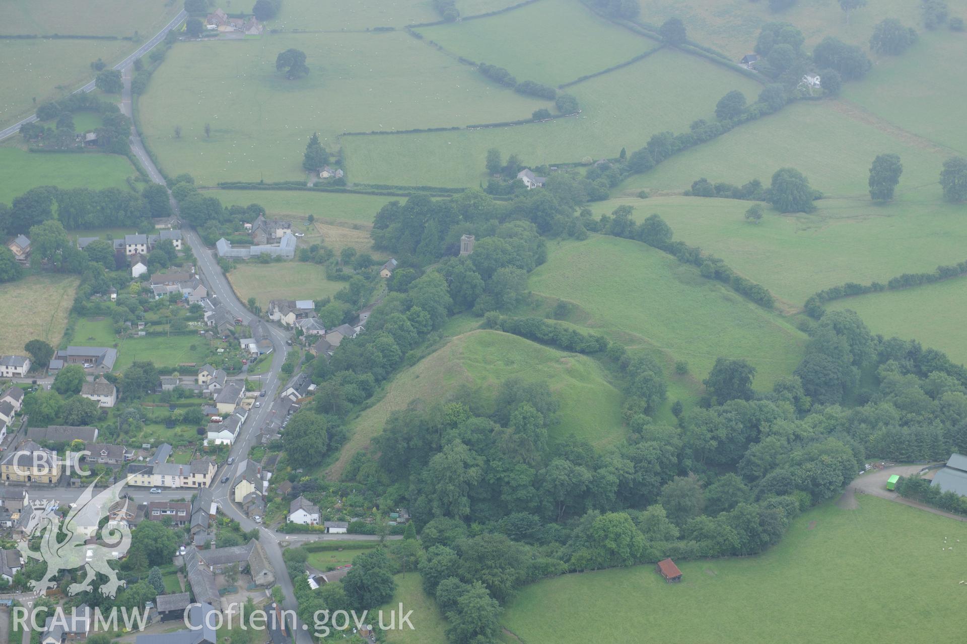 New Radnor Castle, on the north western edge of New Radnor town. Oblique aerial photograph taken during the Royal Commission?s programme of archaeological aerial reconnaissance by Toby Driver on 1st August 2013.