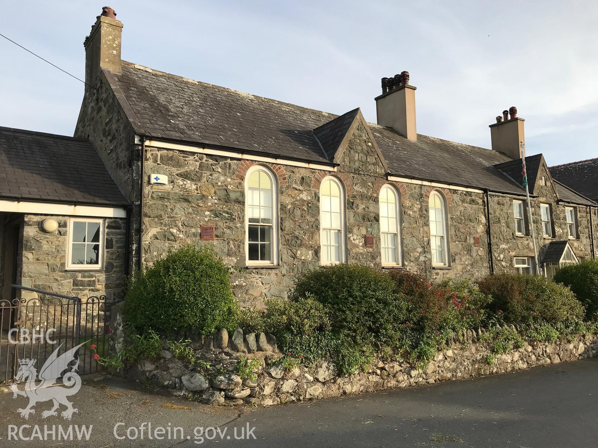 Colour photo showing external view of housing at Clynnog Fawr village, taken by Paul R. Davis, 23rd June 2018.