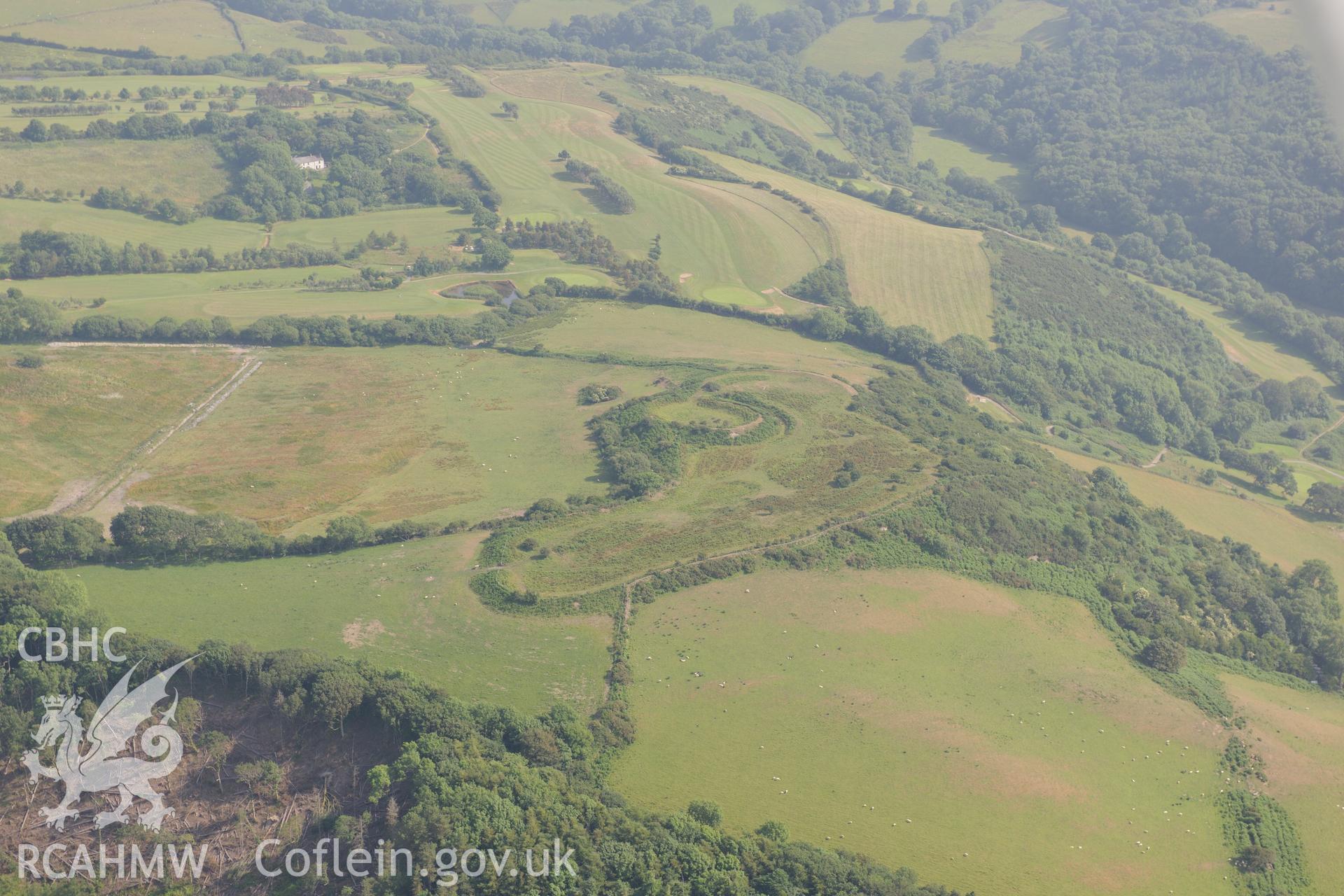 Caer Penrhos hillfort, east of Llanrhystud. Oblique aerial photograph taken during the Royal Commission?s programme of archaeological aerial reconnaissance by Toby Driver on 12th July 2013.