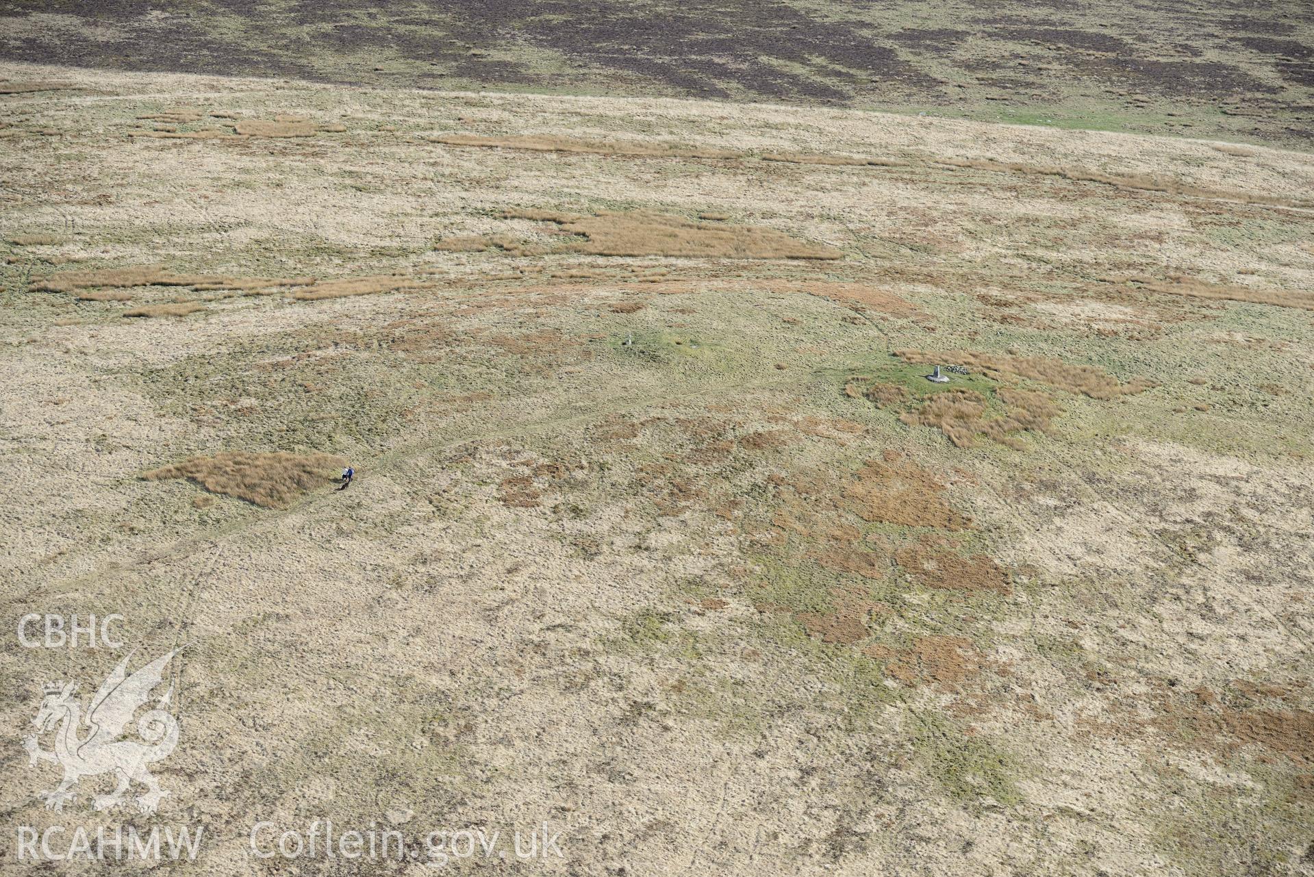 Foel Cwm-Cerwyn II - IV, Cairns. Oblique aerial photograph taken during the Royal Commission's programme of archaeological aerial reconnaissance by Toby Driver on 15th April 2015.'