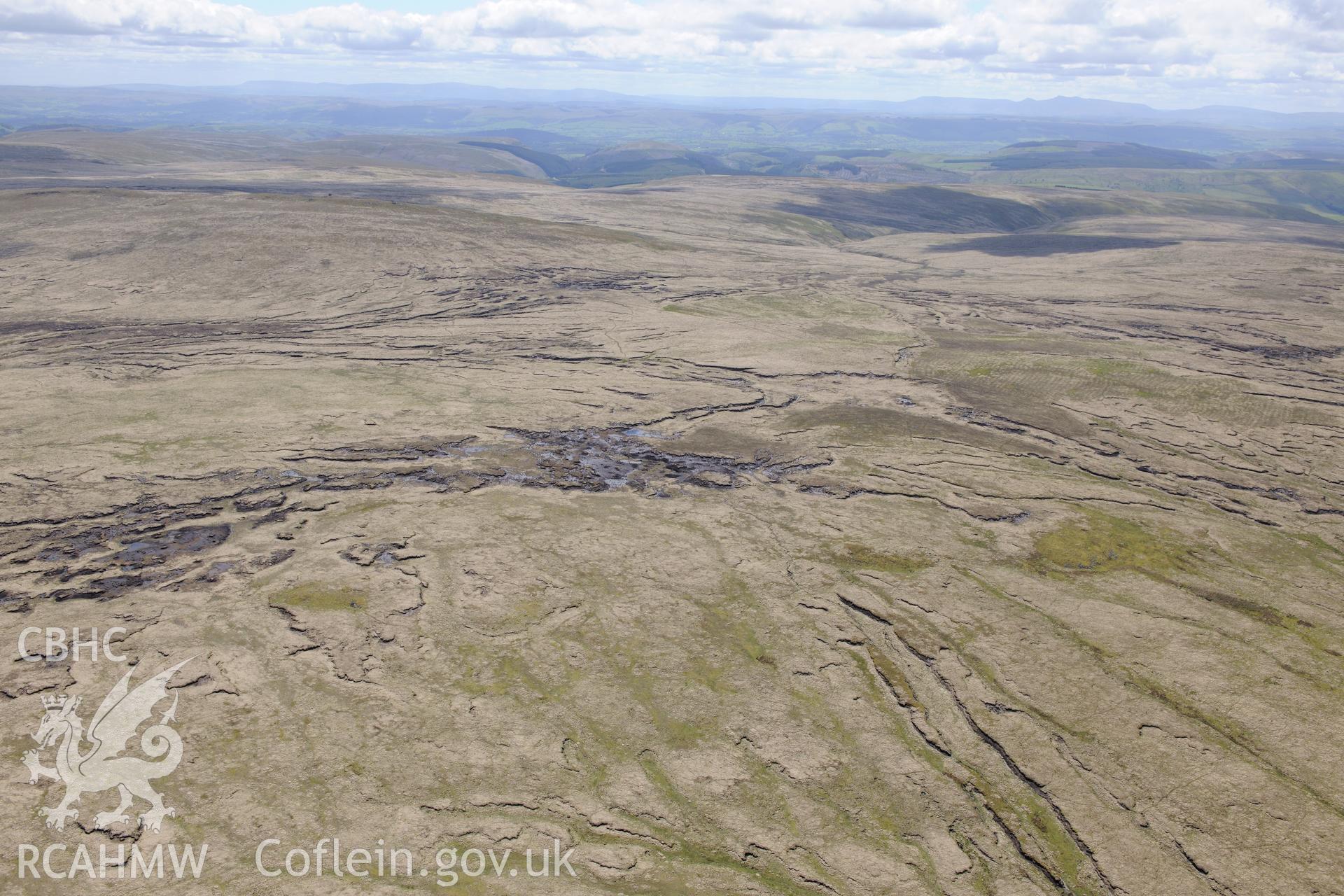 Nant-y-Garw lead mine, associated buildings and smithy chimney. Oblique aerial photograph taken during the Royal Commission's programme of archaeological aerial reconnaissance by Toby Driver on 3rd June 2015.