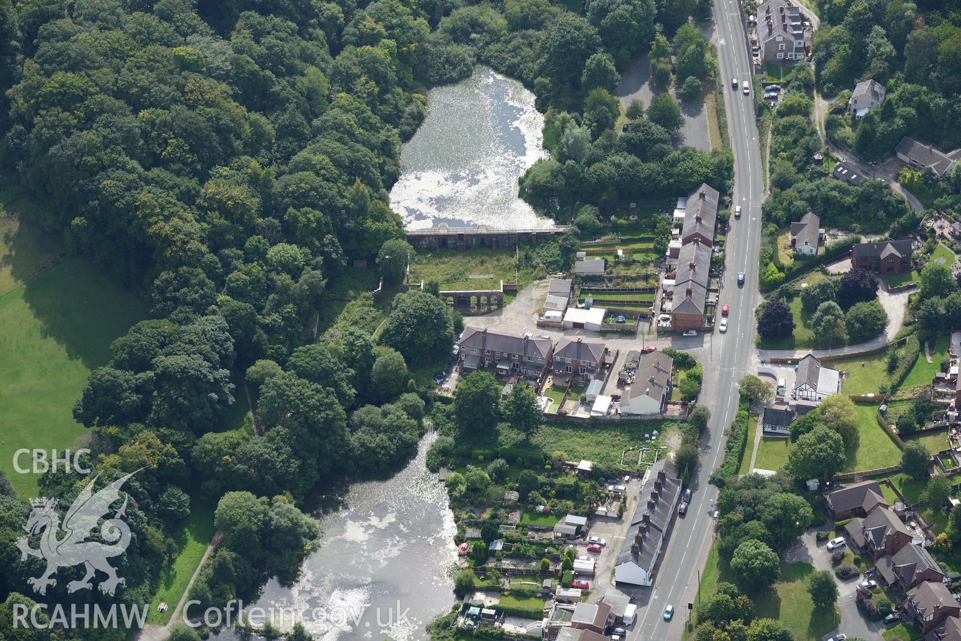 Meadow Mills, Greenfield Valley Heritage Park, Holywell. Oblique aerial photograph taken during the Royal Commission's programme of archaeological aerial reconnaissance by Toby Driver on 11th September 2015.