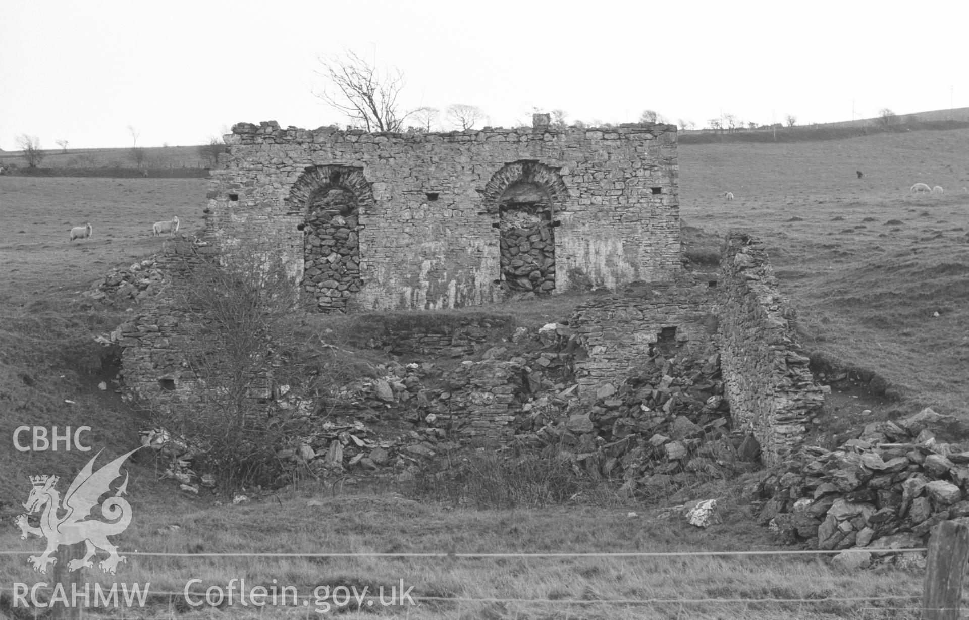 Digital copy of a black and white negative showing ore hopper remains at Darren lead mine, on the southern side of Nant Silo near Goginan, east of Aberystwyth. Photographed in December 1963 by Arthur O. Chater.