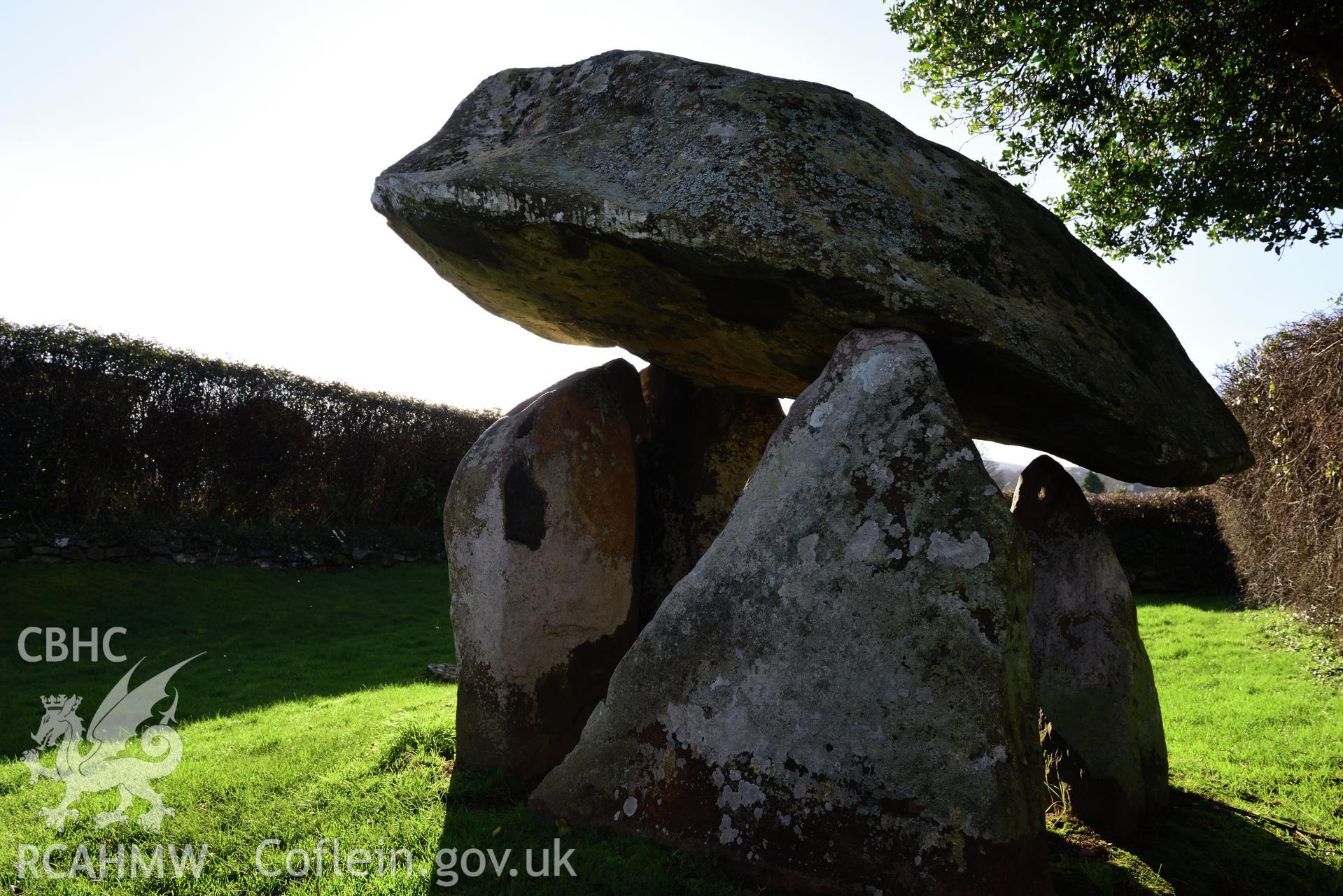 Royal Commission photo survey of Carreg Coetan chambered tomb in winter light, by Toby Driver