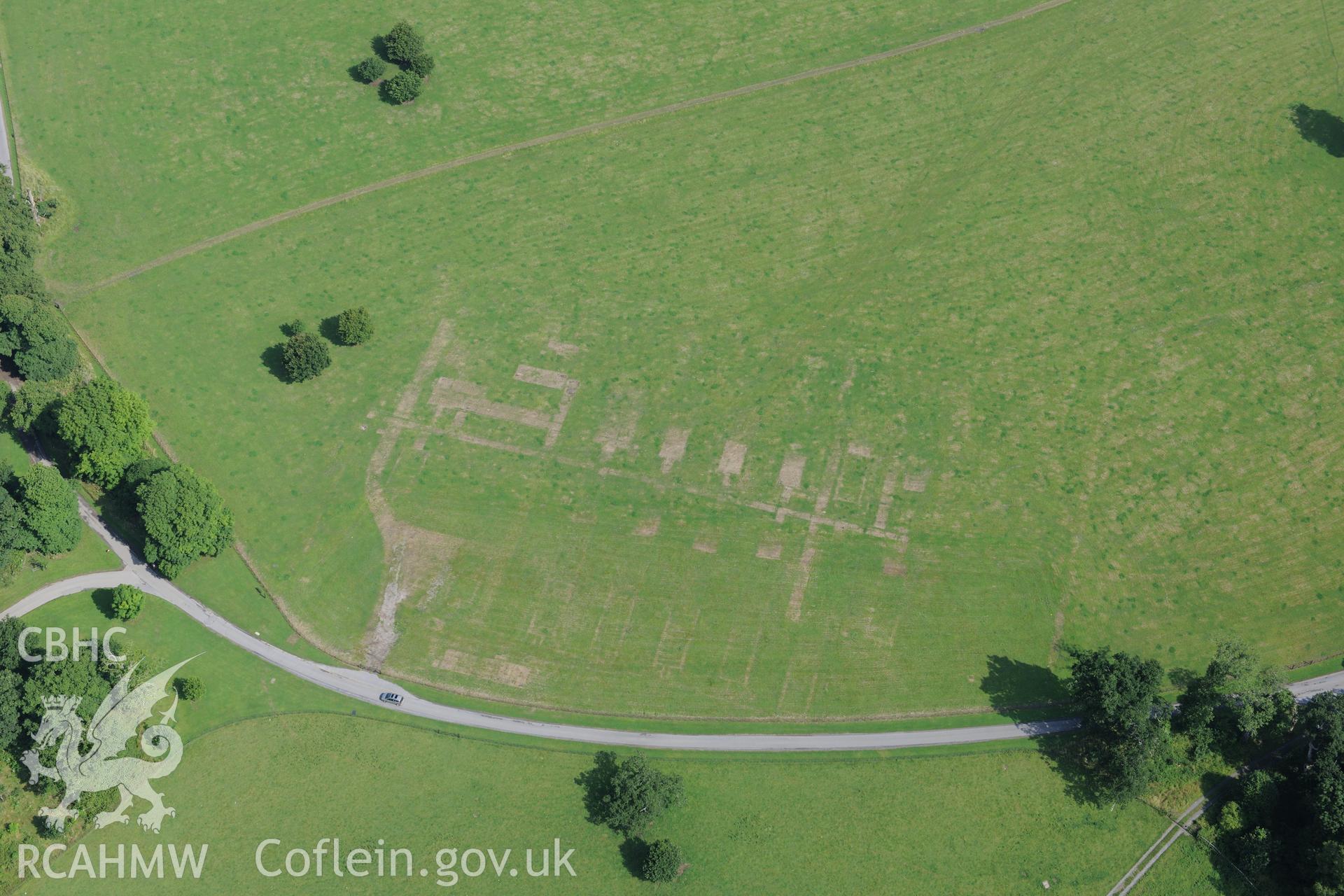 Dinefor Park Second World War Military Camp. Oblique aerial photograph taken during the Royal Commission?s programme of archaeological aerial reconnaissance by Toby Driver on 1st August 2013.