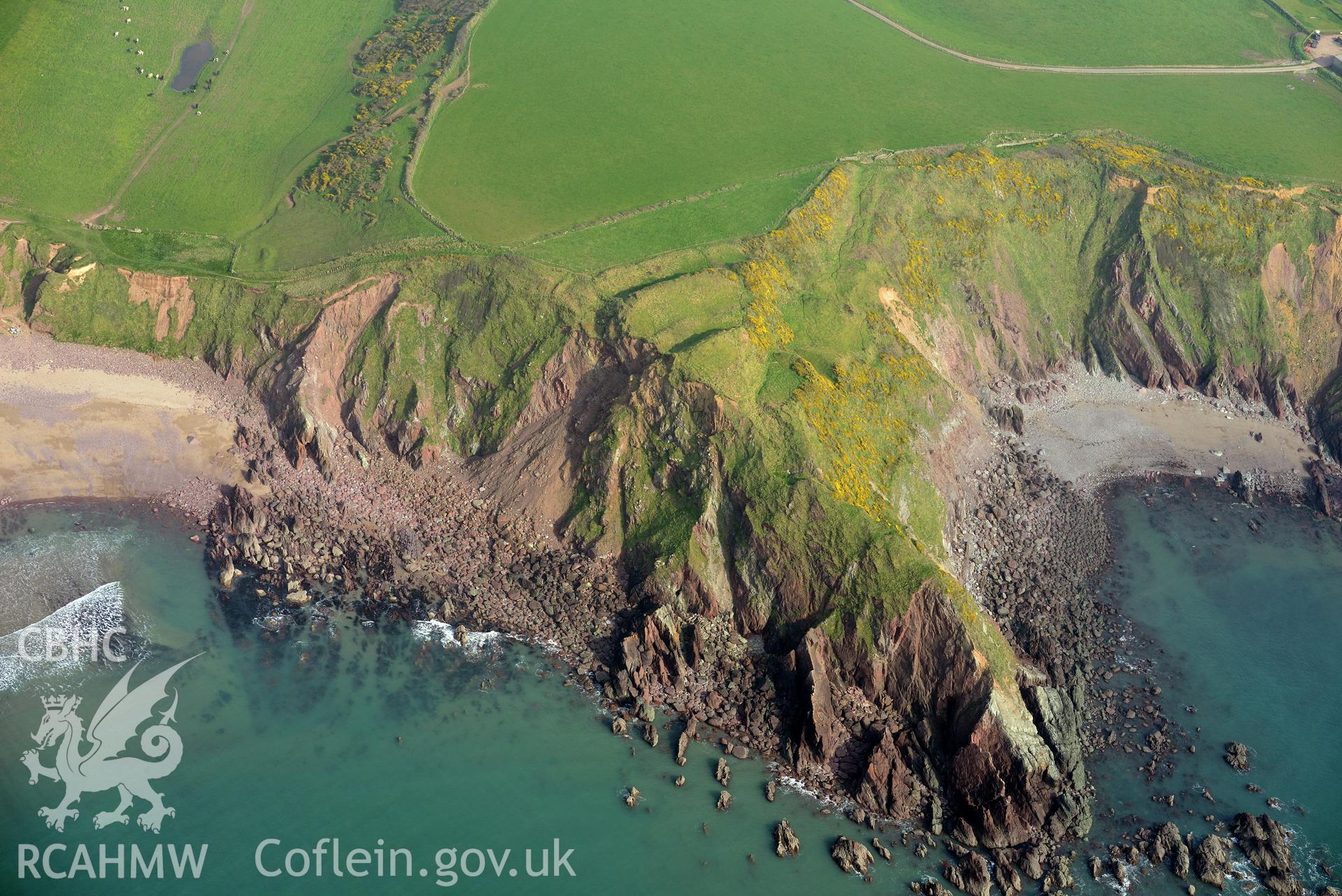 Aerial photography of Great Castle Head taken on 27th March 2017. Baseline aerial reconnaissance survey for the CHERISH Project. ? Crown: CHERISH PROJECT 2017. Produced with EU funds through the Ireland Wales Co-operation Programme 2014-2020. All material made freely available through the Open Government Licence.