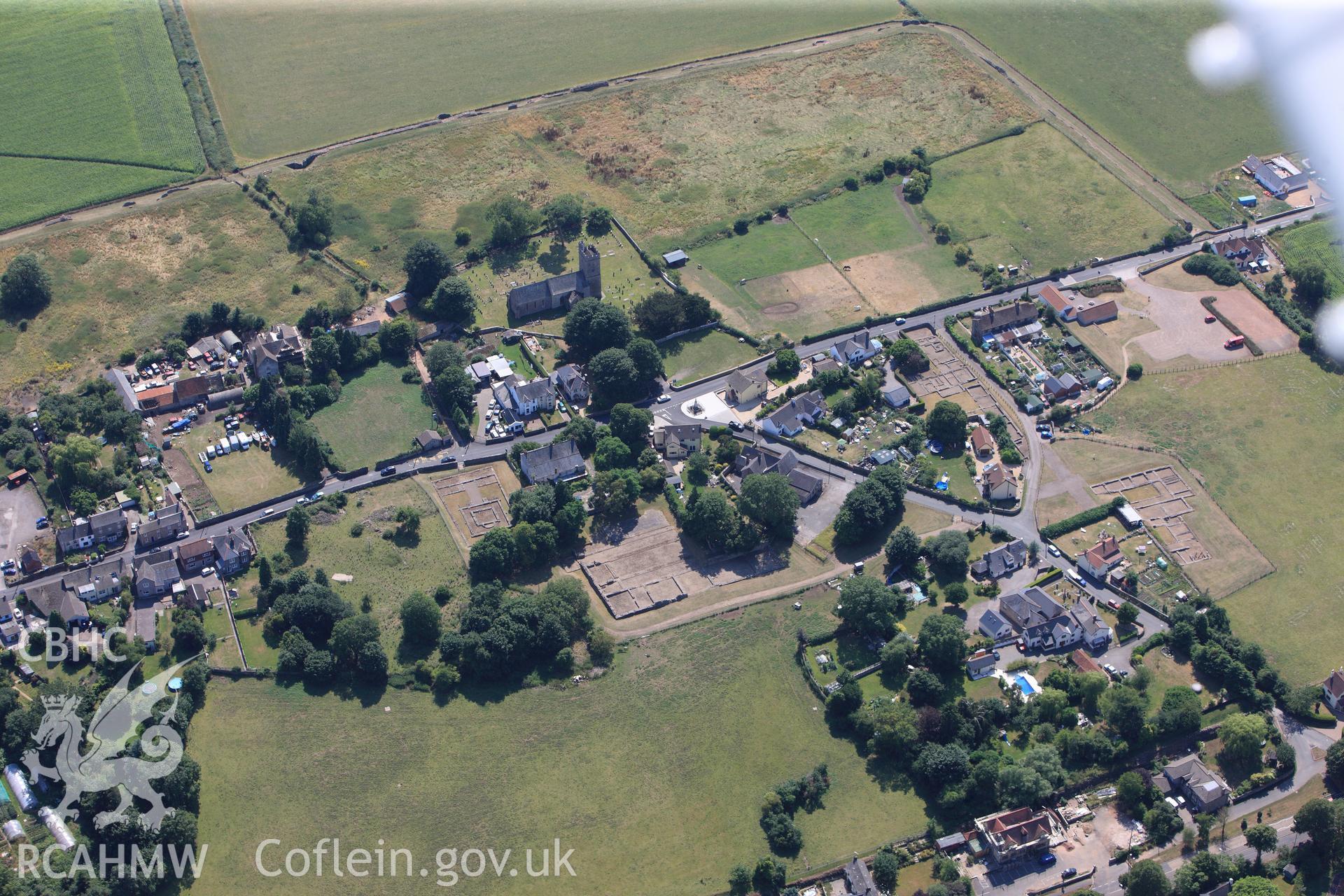 St. Stephen's church, Roman Amphitheatre, Roman Temple and Venta Silurum (Caerwent Roman City), Caerwent, near Chepstow. Oblique aerial photograph taken during the RCAHMW?s programme of archaeological aerial reconnaissance by Toby Driver, 1st August 2013.