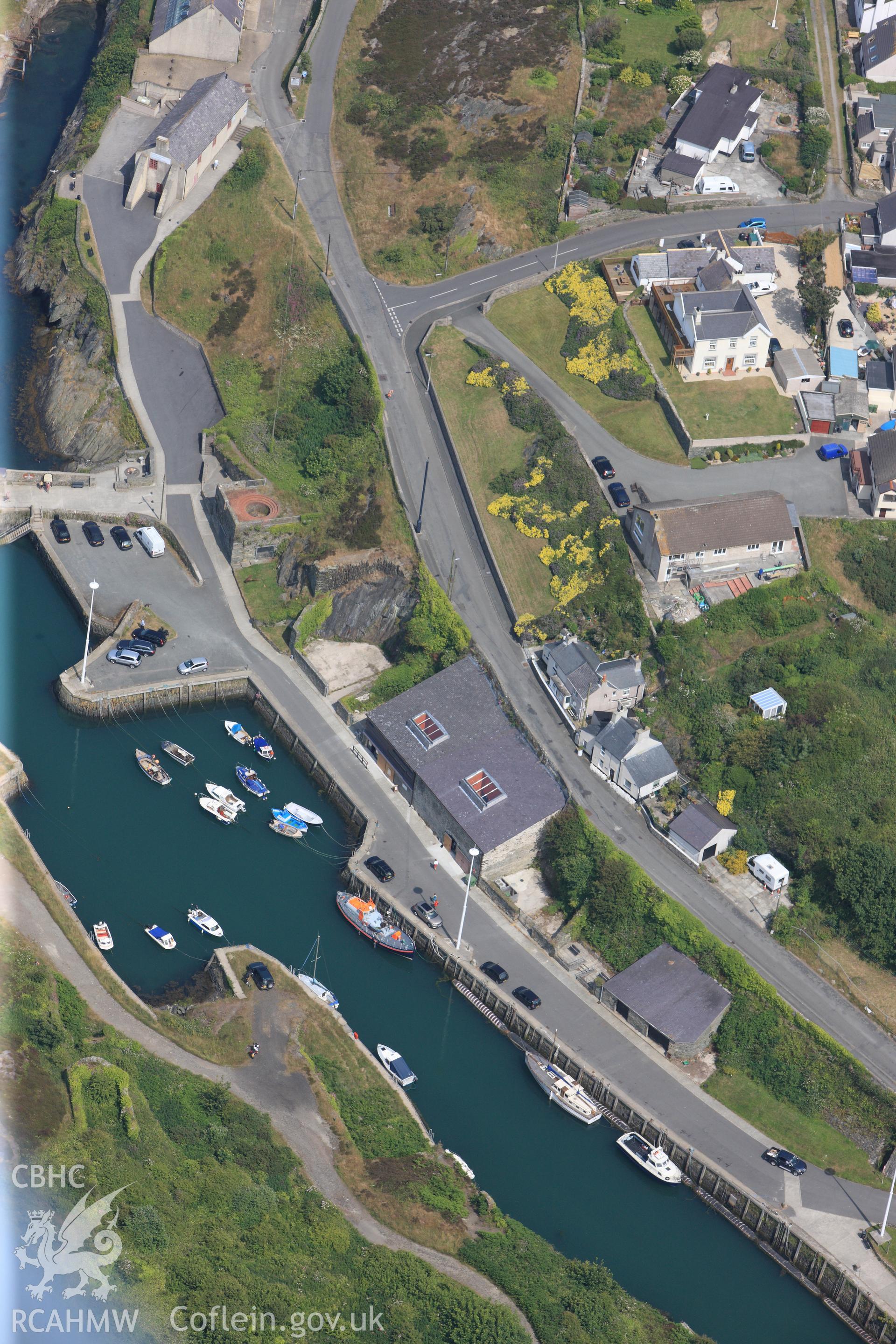 Amlwch harbour, Anglesey. Oblique aerial photograph taken during the Royal Commission?s programme of archaeological aerial reconnaissance by Toby Driver on 12th July 2013.