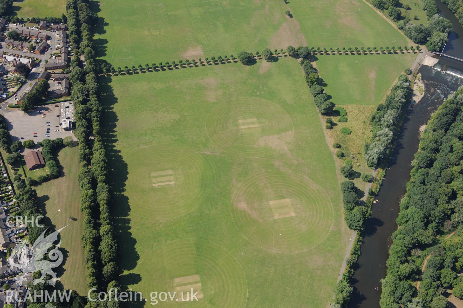 Parchmark of rectangular structures at Pontcanna Fields, Llandaff, Cardiff. Oblique aerial photograph taken during the Royal Commission?s programme of archaeological aerial reconnaissance by Toby Driver on 1st August 2013.