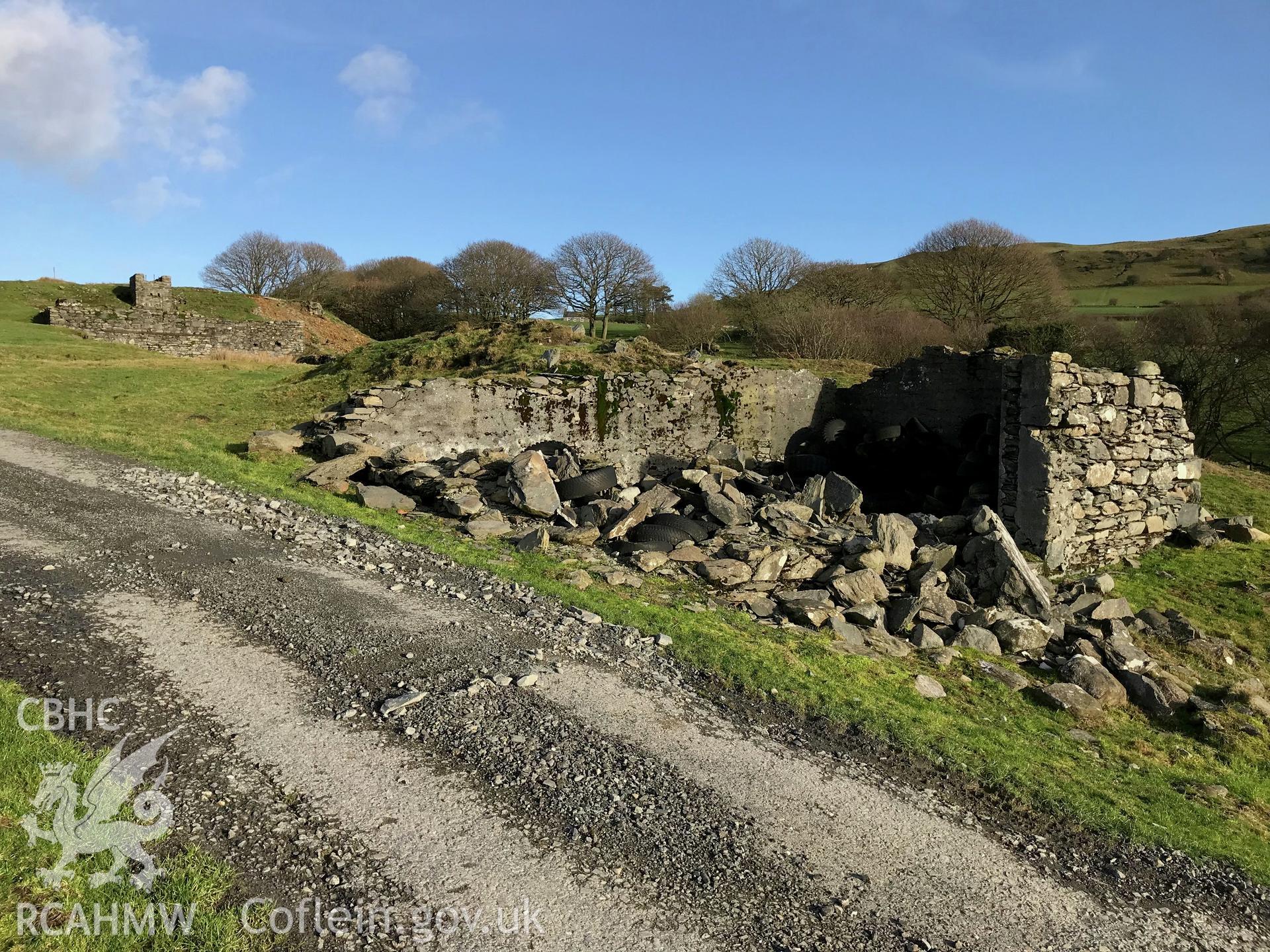 View from the south of derelict buildings at Cwm Mawr mine, north of Pontrhydfendigaid. Colour photograph taken by Paul R. Davis on 17th January 2019.