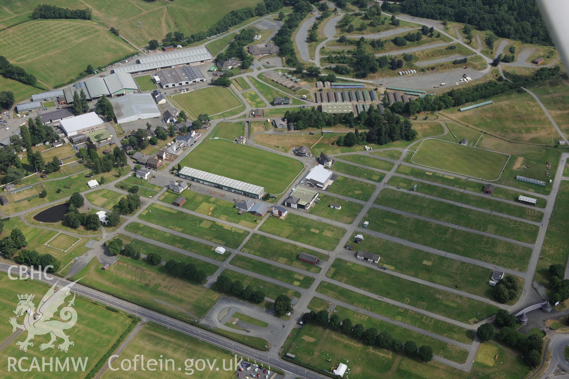 The Royal Welsh Showground, Llanelwedd. Oblique aerial photograph taken during the Royal Commission?s programme of archaeological aerial reconnaissance by Toby Driver on 1st August 2013.