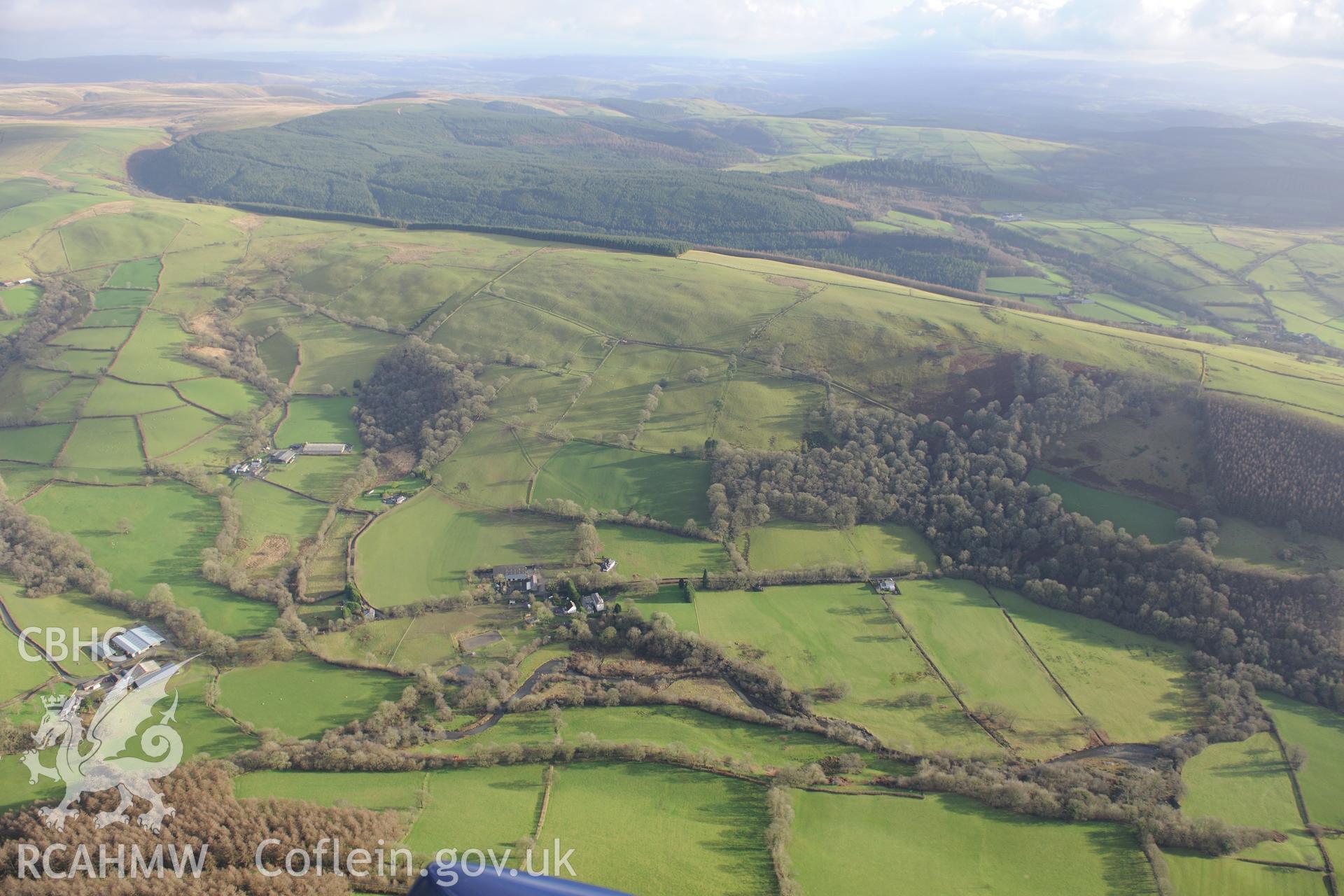 Brunant Mansion and Garden; Ty'n Llwyn Cottage and Allt-y-Brunant, a Roman Water Tank. Oblique aerial photograph taken during the Royal Commission's programme of archaeological aerial reconnaissance by Toby Driver on 6th January 2015.