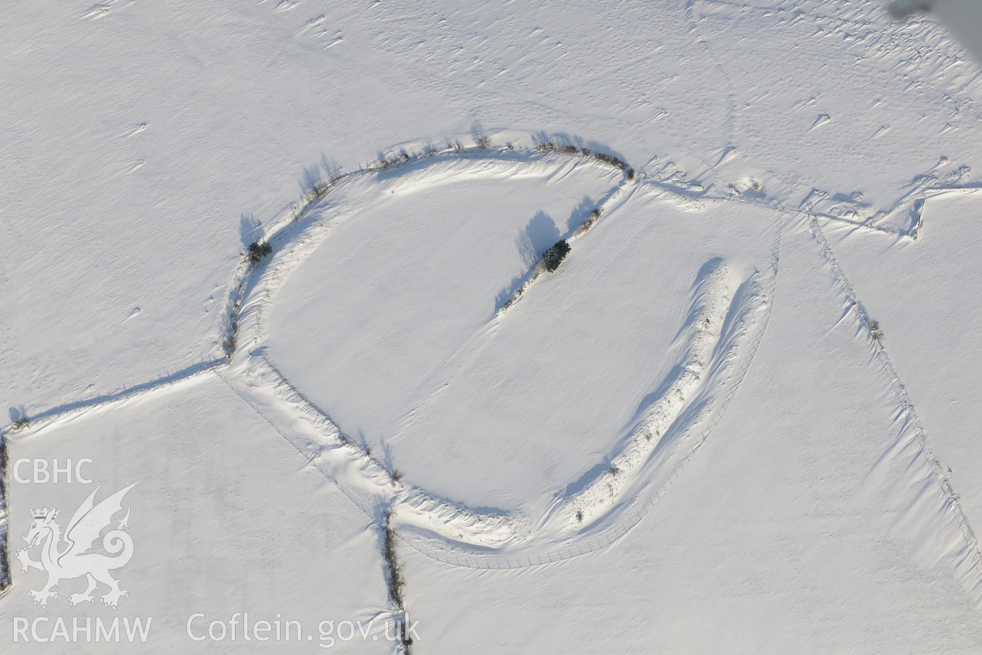 Coedcae Gaer hillfort, north east of Bridgend. Oblique aerial photograph taken during the Royal Commission?s programme of archaeological aerial reconnaissance by Toby Driver on 24th January 2013.