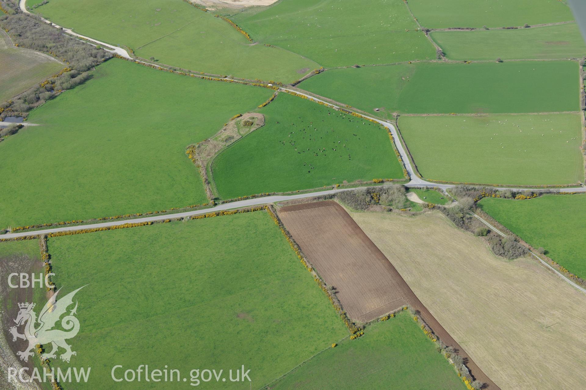 Crugiau Cemmaes Barrow I and II. Oblique aerial photograph taken during the Royal Commission's programme of archaeological aerial reconnaissance by Toby Driver on 15th April 2015.