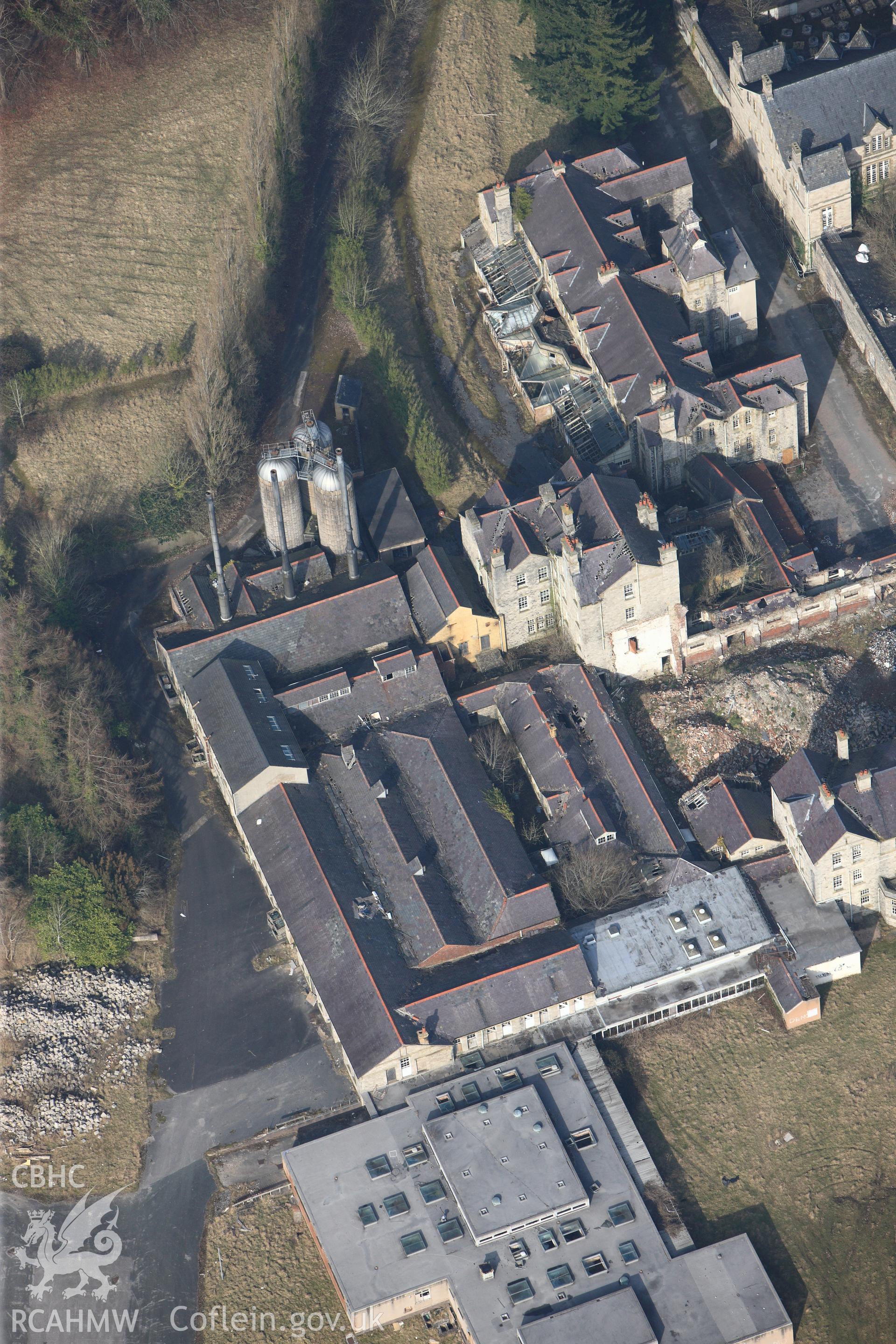 The North Wales Counties Hospital, Denbigh. Oblique aerial photograph taken during the Royal Commission?s programme of archaeological aerial reconnaissance by Toby Driver on 28th February 2013.