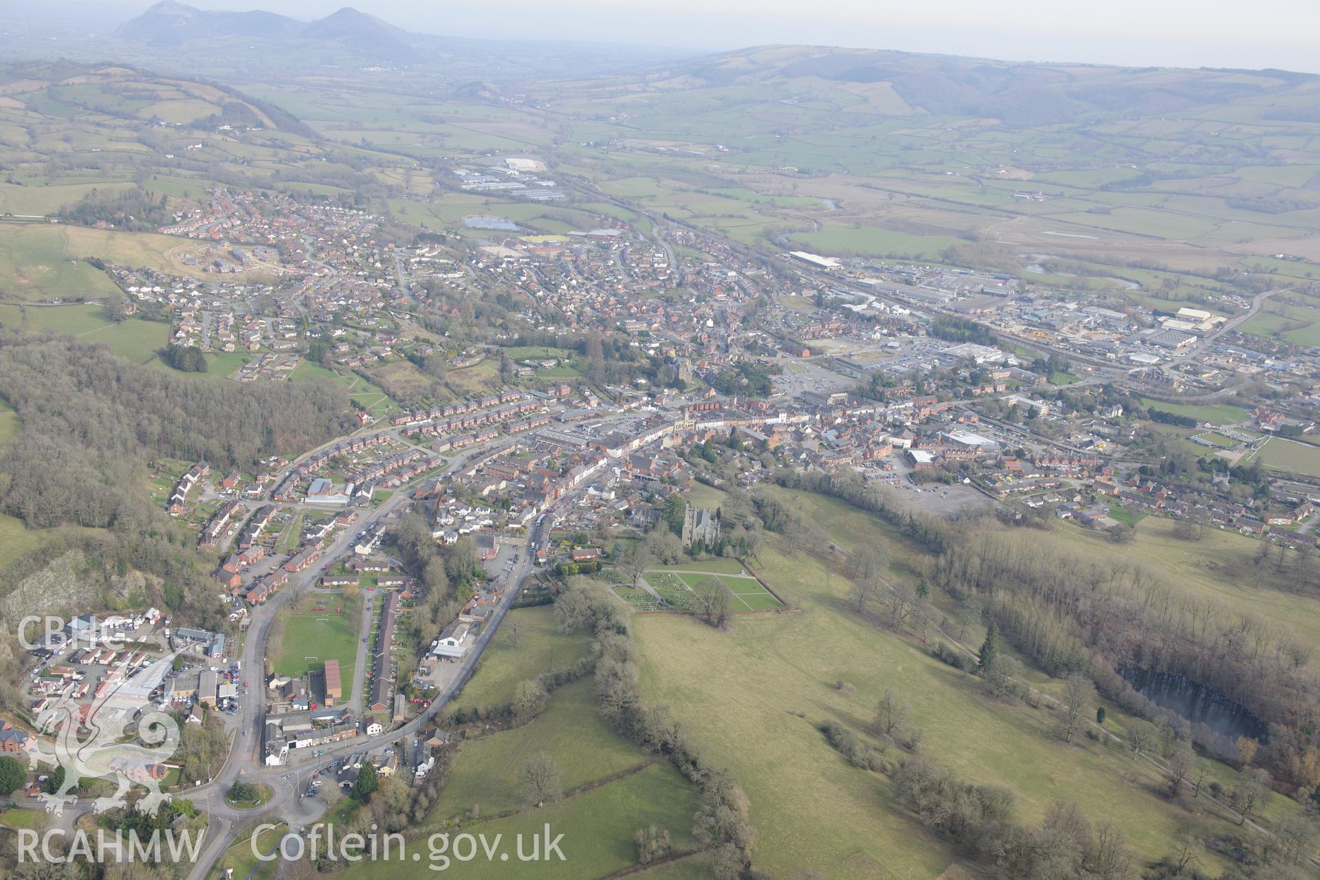 Christ church, surrounded by the town of Welshpool. Oblique aerial photograph taken during the Royal Commission?s programme of archaeological aerial reconnaissance by Toby Driver on 28th February 2013.