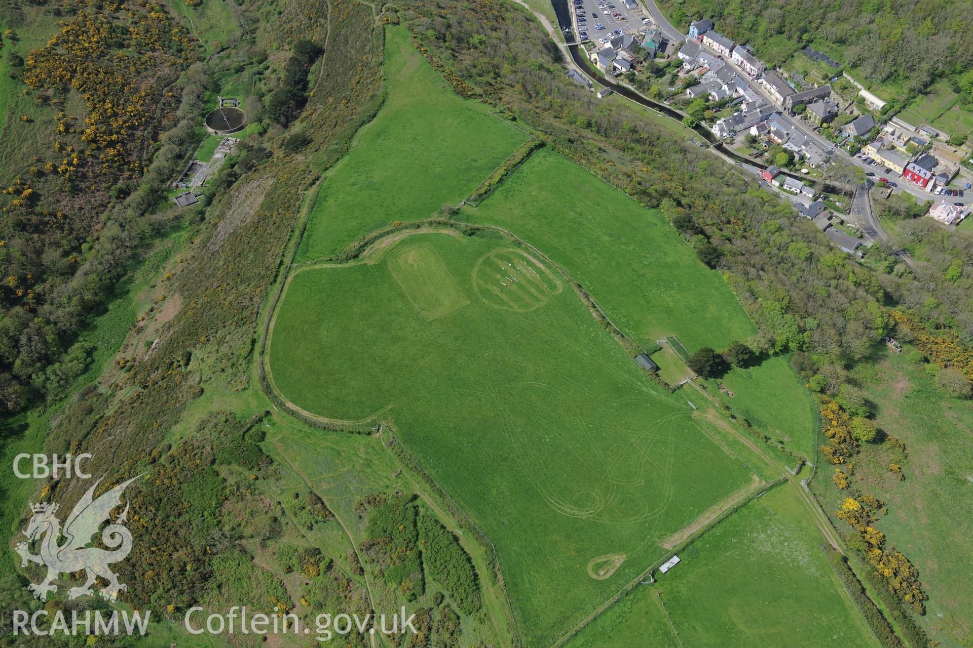 Solva defended enclosure, Solva. Oblique aerial photograph taken during the Royal Commission's programme of archaeological aerial reconnaissance by Toby Driver on 13th May 2015.