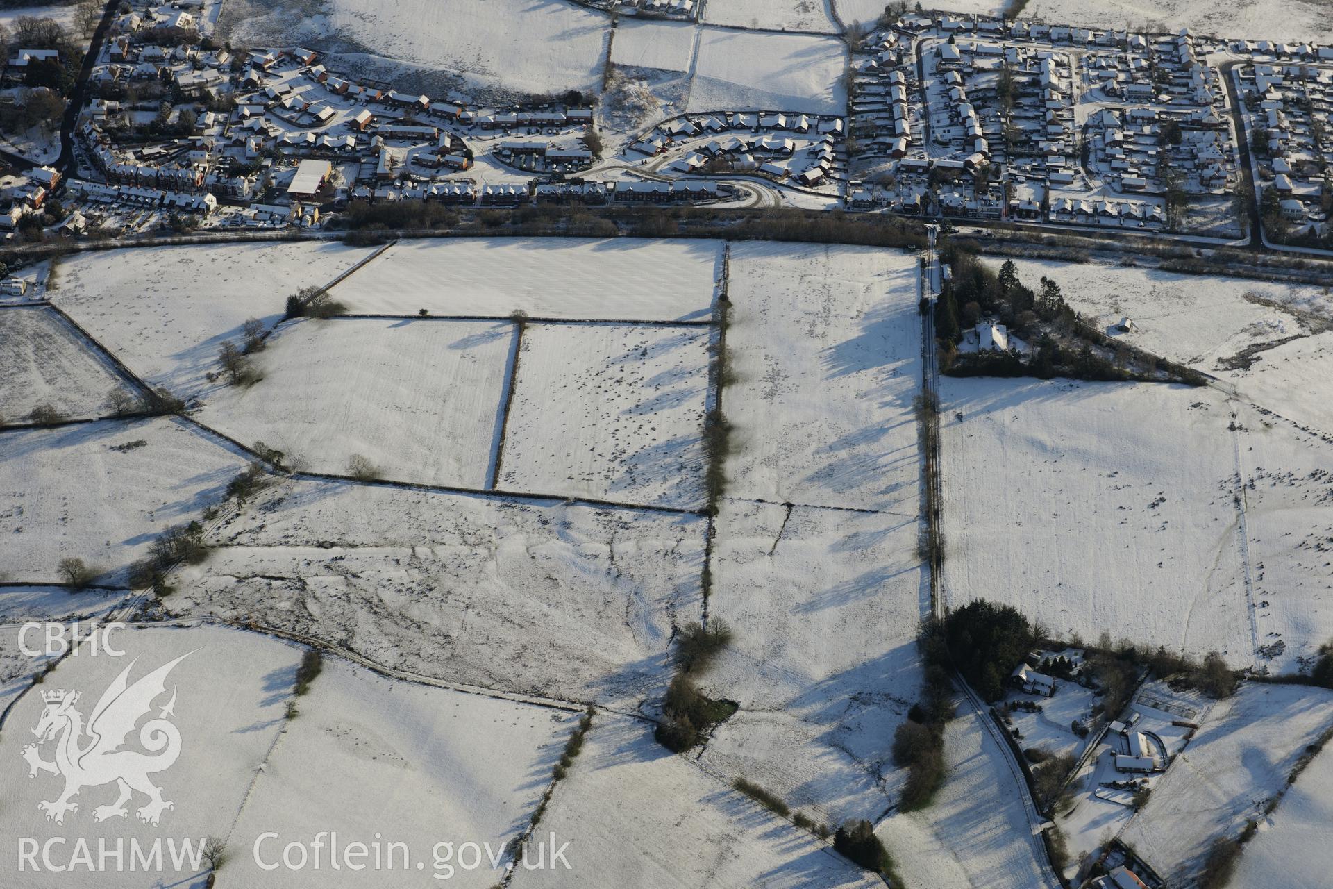 Roman camps VI to XIV on Llandrindod Common. Oblique aerial photograph taken during the Royal Commission?s programme of archaeological aerial reconnaissance by Toby Driver on 15th January 2013.