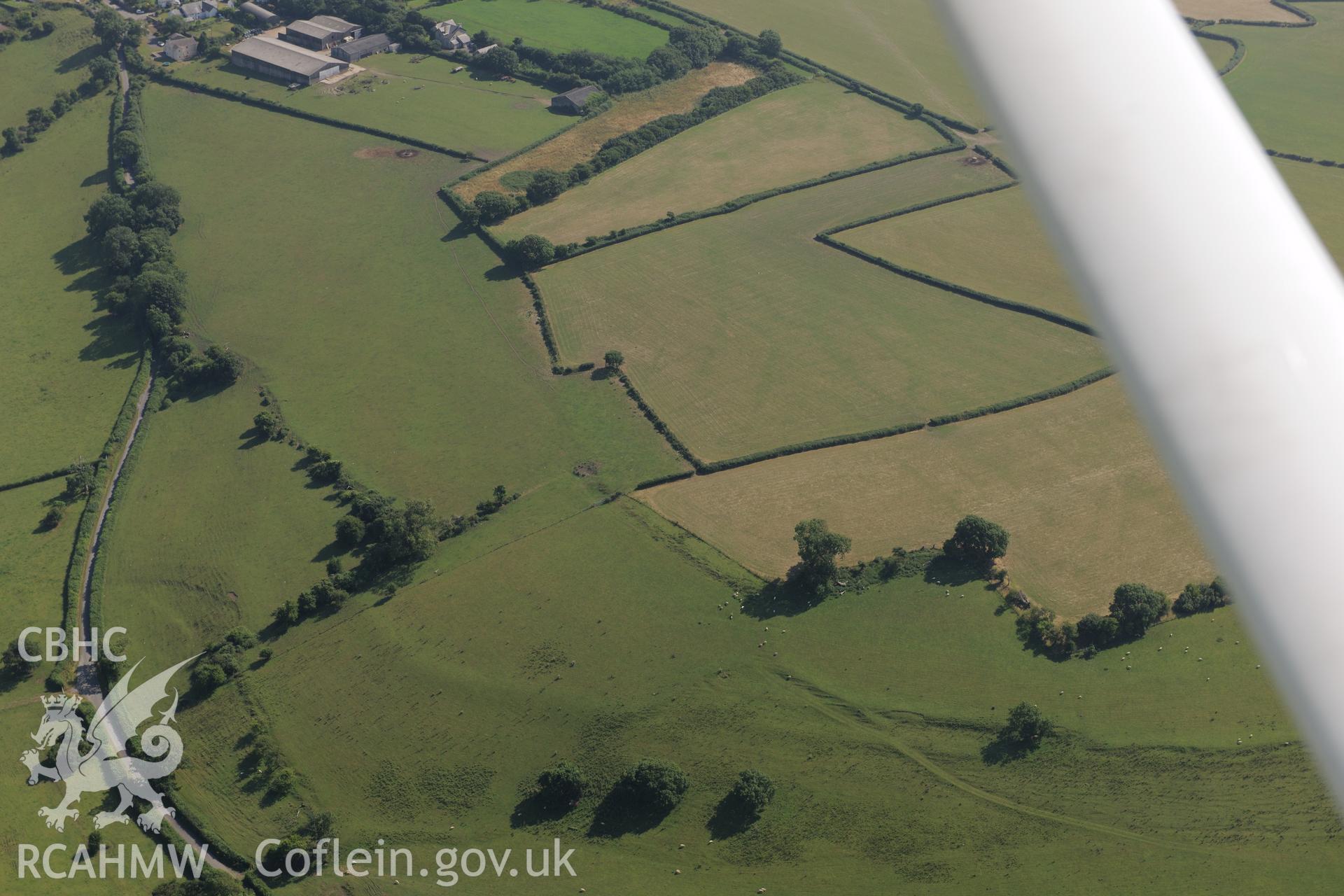Flemingston causewayed enclosure, north of St Athan. Oblique aerial photograph taken during the Royal Commission?s programme of archaeological aerial reconnaissance by Toby Driver on 1st August 2013.