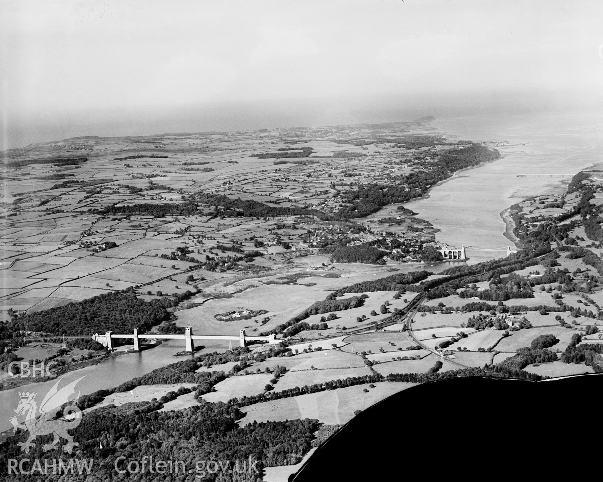 View of the Menai Stait showing bridges and Ynys Gorad Goch, oblique aerial view. 5?x4? black and white glass plate negative.