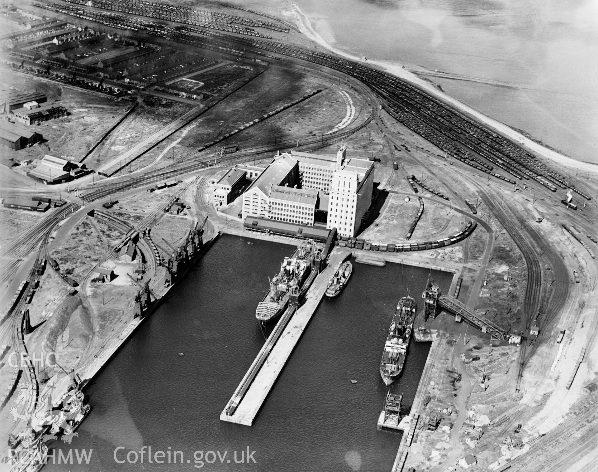 View of Spillers Ltd., Cardiff, oblique aerial view. 5?x4? black and white glass plate negative.