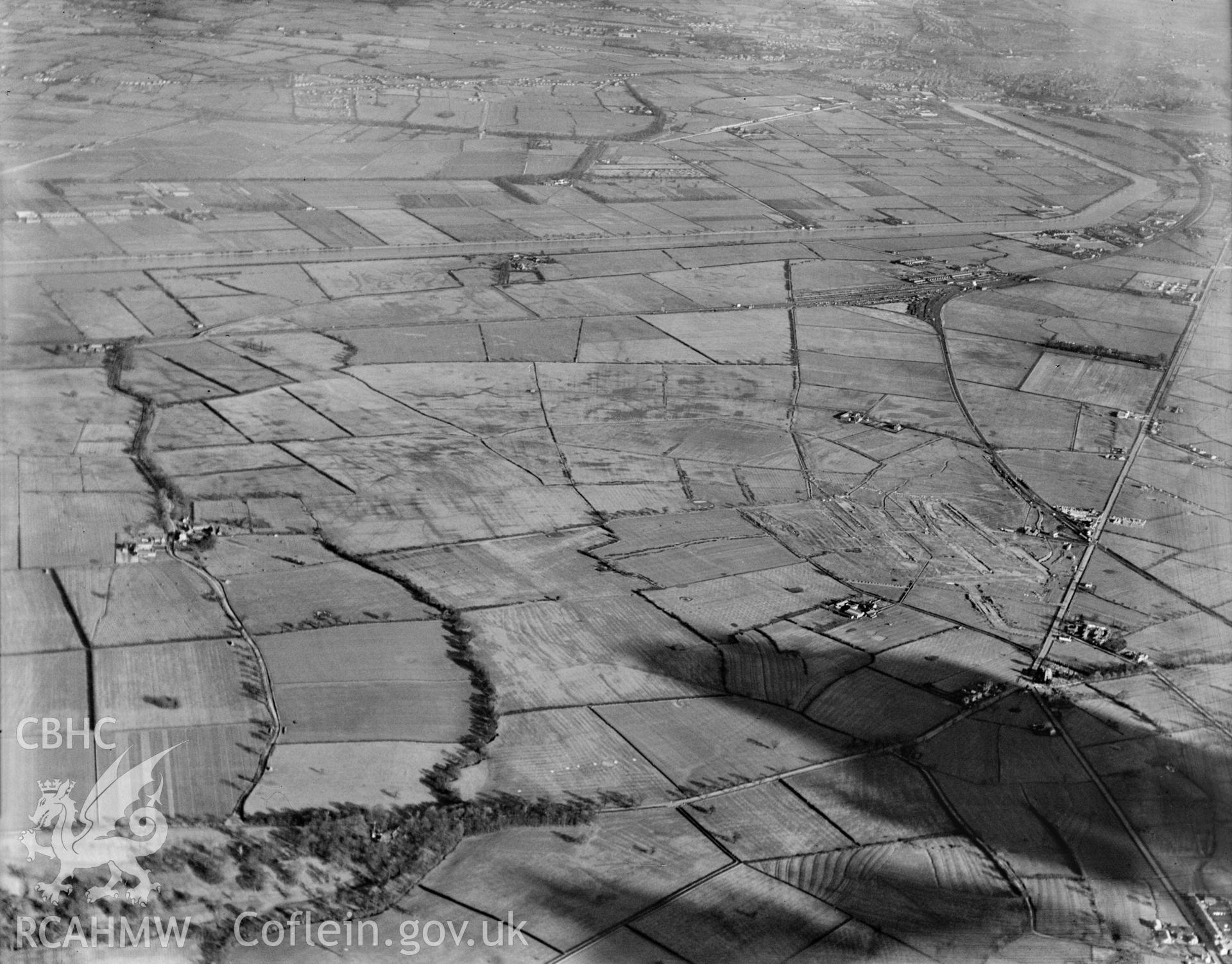 High altitude view of Vickers-Armstrong Ltd. Works - Broughton airfield under construction. Oblique aerial photograph, 5?x4? BW glass plate.