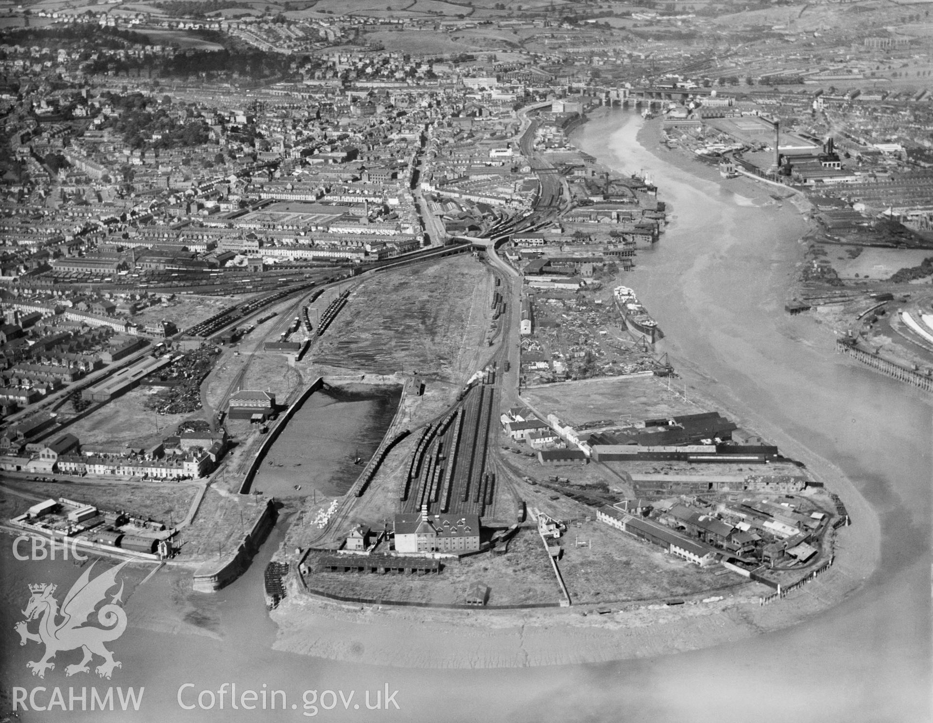 Black and white oblique aerial photograph showing Newport Docks: Town Dock, from Aerofilms album Monmouth N-Pe (448), taken by Aerofilms Ltd and dated 1937.