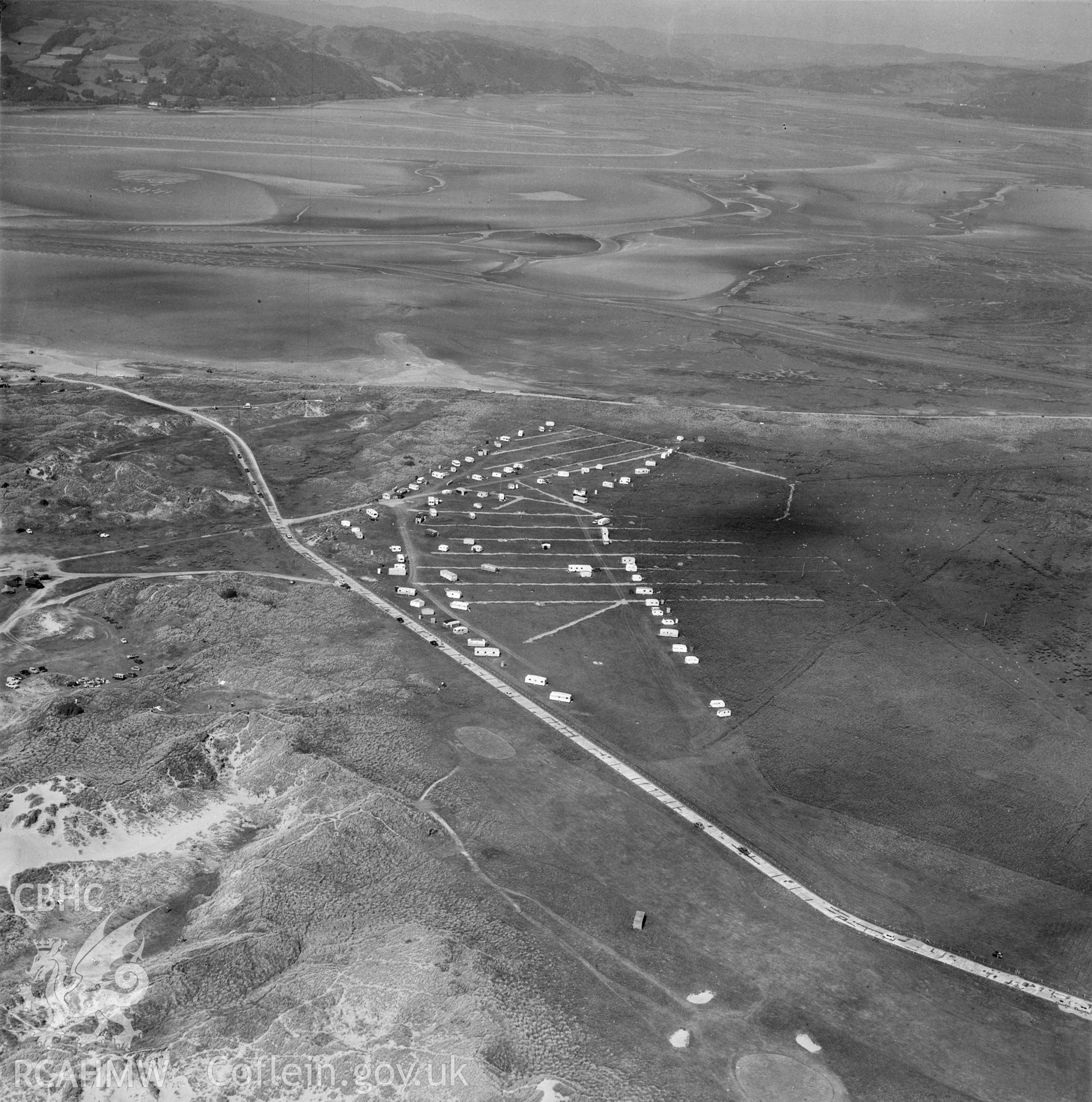 Black and white oblique aerial photograph showing caravans at Ynyslas, from Aerofilms album Cardiganshire no W30, taken by Aerofilms Ltd and dated 1962.