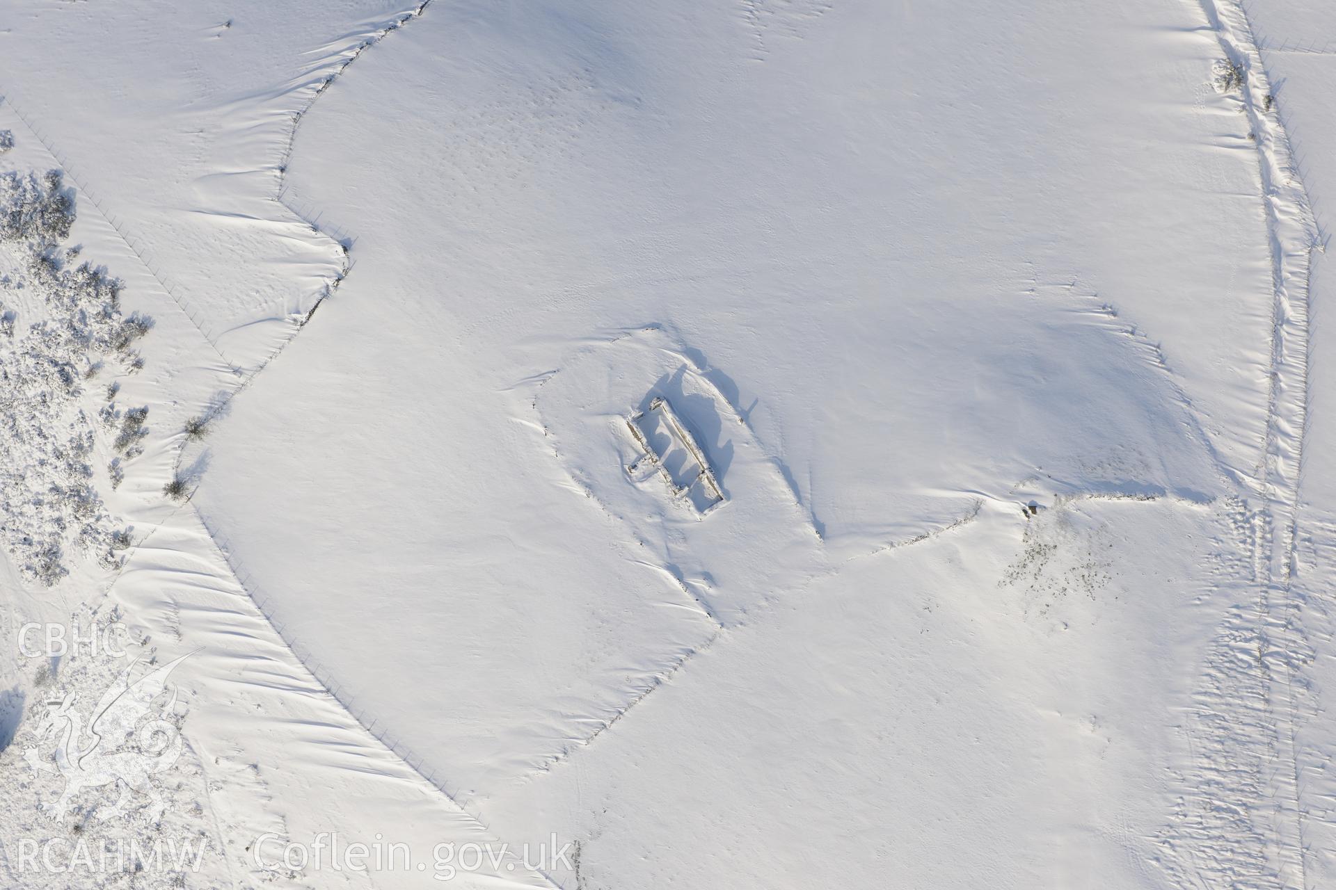 Remains of St. Peter's church, Llanbad, north of Llanharan, Bridgend. Oblique aerial photograph taken during the Royal Commission?s programme of archaeological aerial reconnaissance by Toby Driver on 24th January 2013.