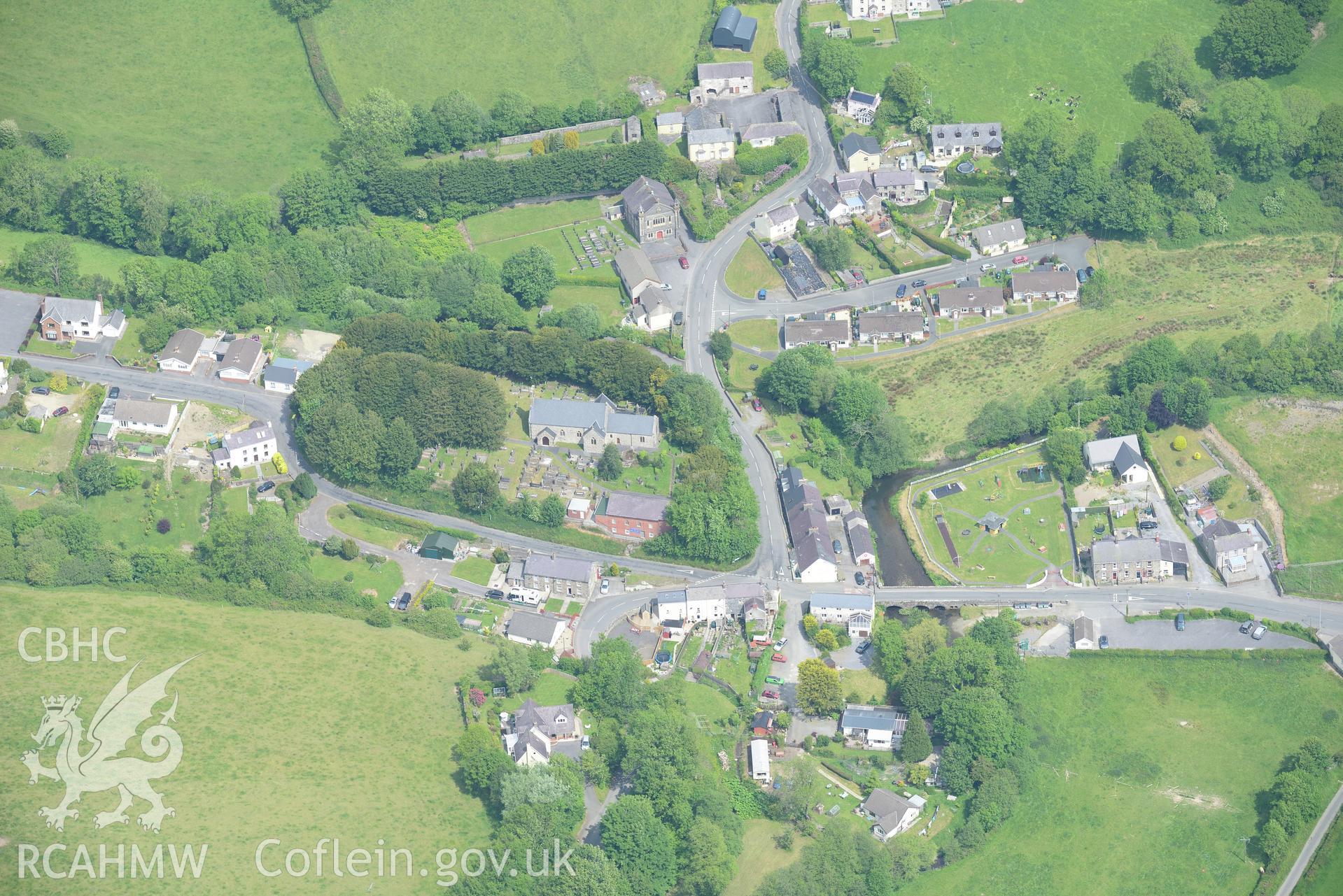 St. David's Church, Salem Welsh Baptist Church and Mydrim bridge at Meidrim village, Carmarthenshire. Oblique aerial photograph taken during the Royal Commission's programme of archaeological aerial reconnaissance by Toby Driver on 11th June 2015.