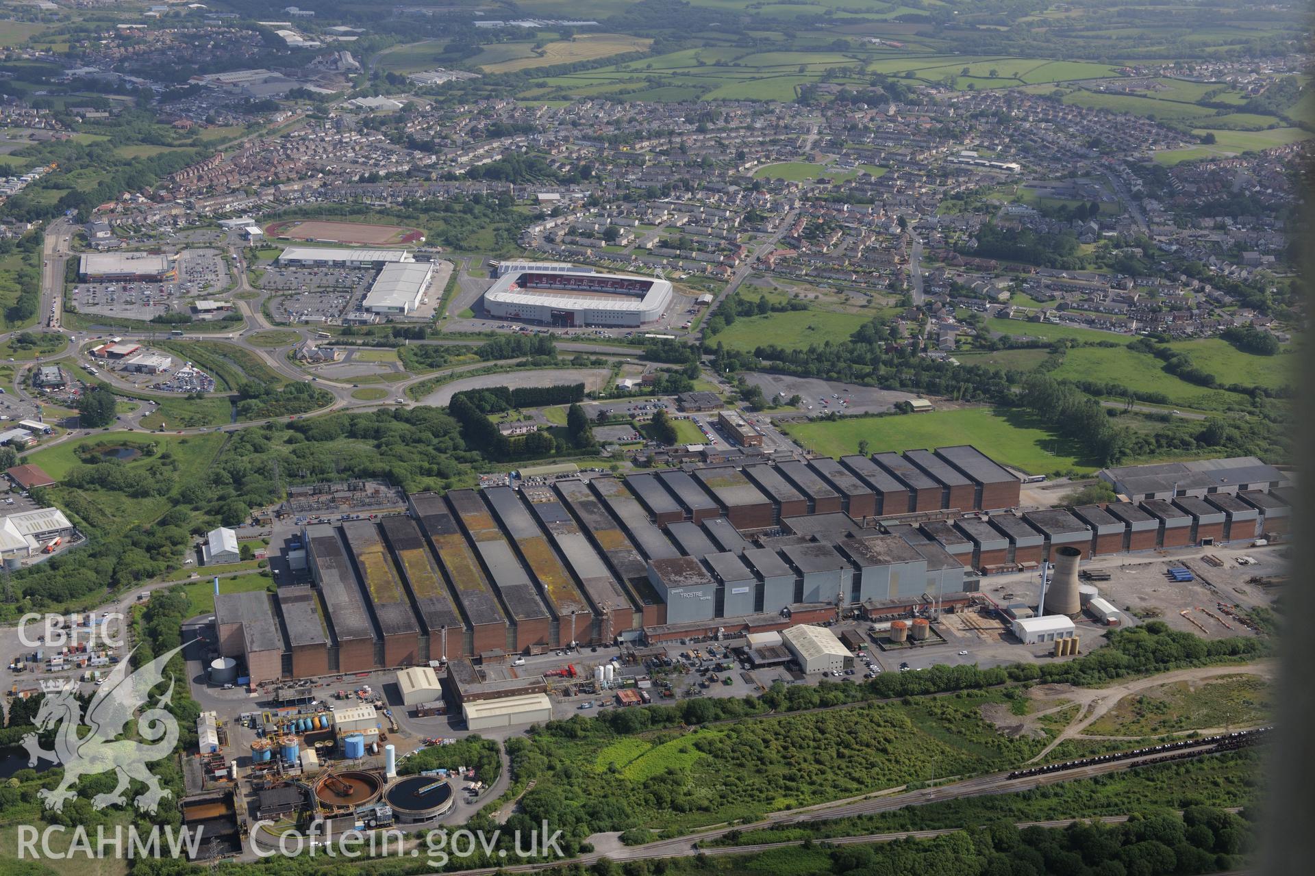 Trostre Steelworks, Maes-ar-Ddafen-Fach Farmhouse and Parc-y-Scarlets, Llanelli. Oblique aerial photograph taken during the Royal Commission's programme of archaeological aerial reconnaissance by Toby Driver on 19th June 2015.