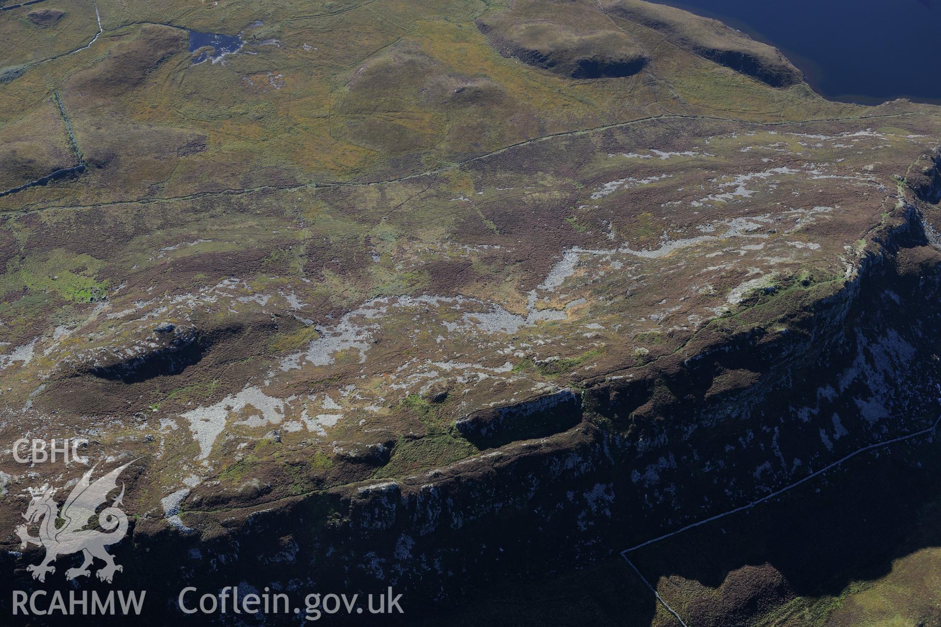 Pared y Cefnhir hillfort, about halfway between Dolgellau and Fairbourne. Oblique aerial photograph taken during the Royal Commission's programme of archaeological aerial reconnaissance by Toby Driver on 2nd October 2015.