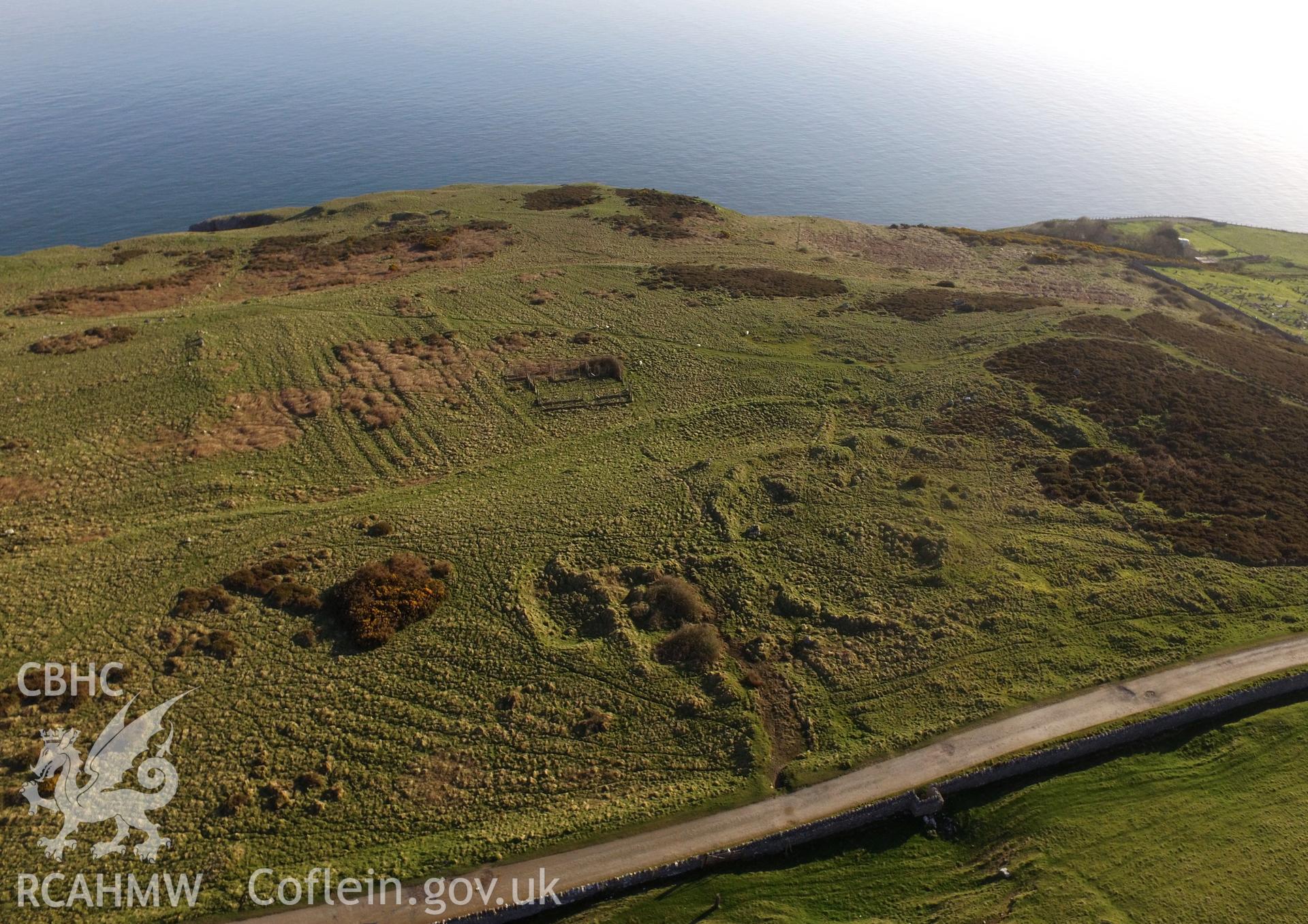 Colour photo showing aerial view of Hwylfa'r Ceirw deserted rural settlement on the Great Orme, Llandudno, taken by Paul R. Davis, 19th April 2018.