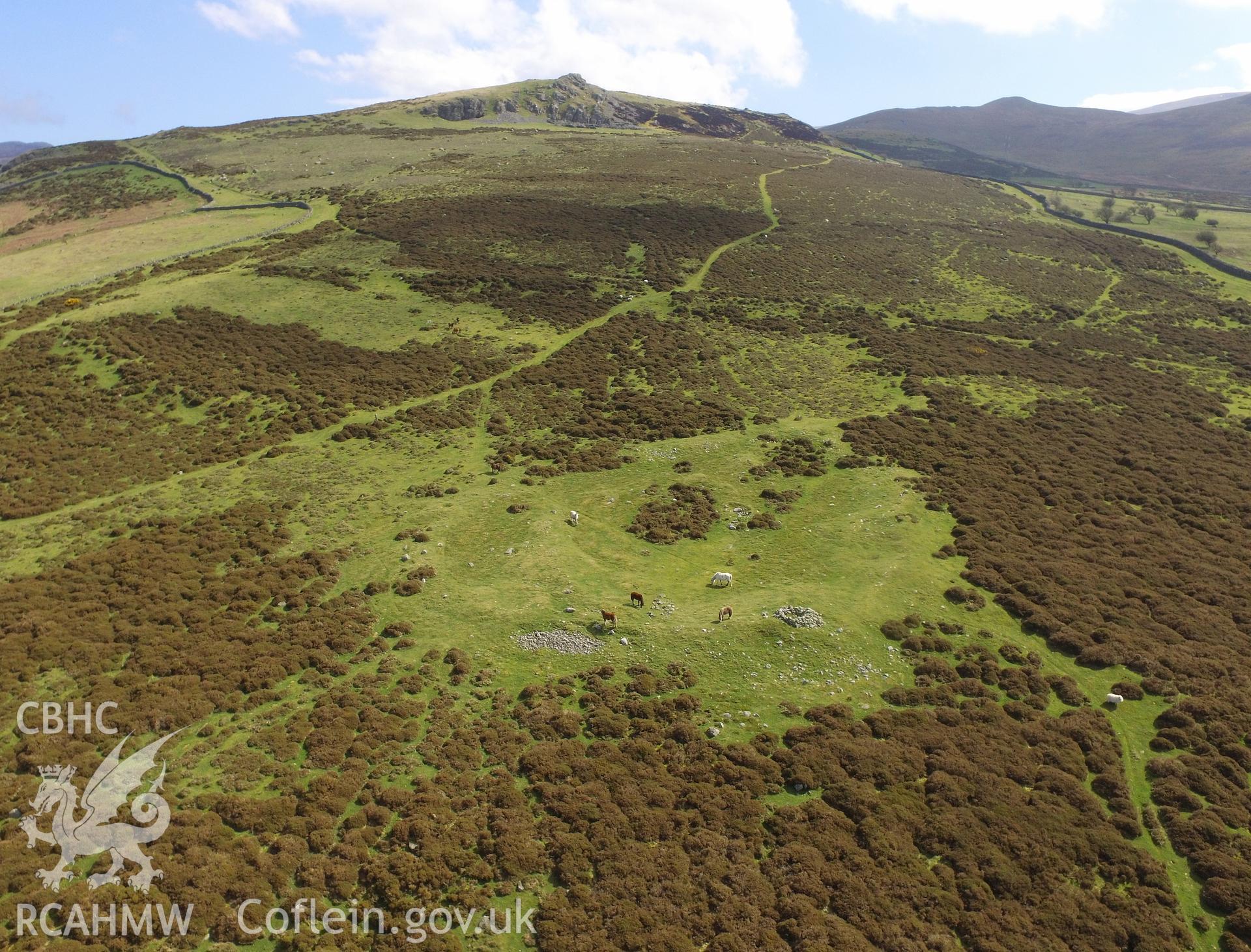 Colour photo showing aerial view of settlement enclosure at Carreg Fawr, Llanfairfechan, taken by Paul R. Davis, 19th April 2018.