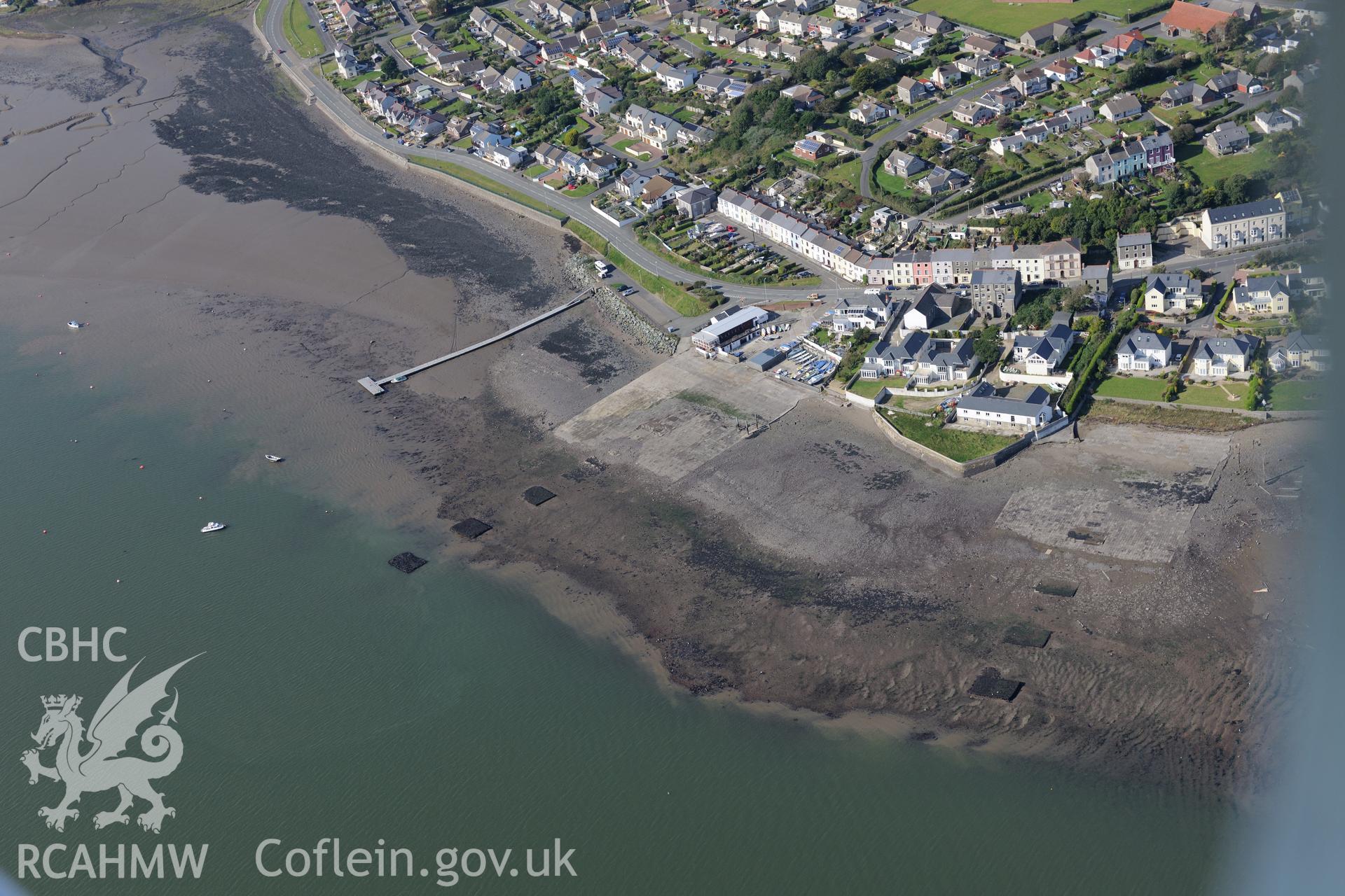 The town of Neyland, its shipyard and two embarkation hards, on the opposite side of the estuary to Pembroke Dock. Oblique aerial photograph taken during the Royal Commission's programme of archaeological aerial reconnaissance by Toby Driver on 30th September 2015.