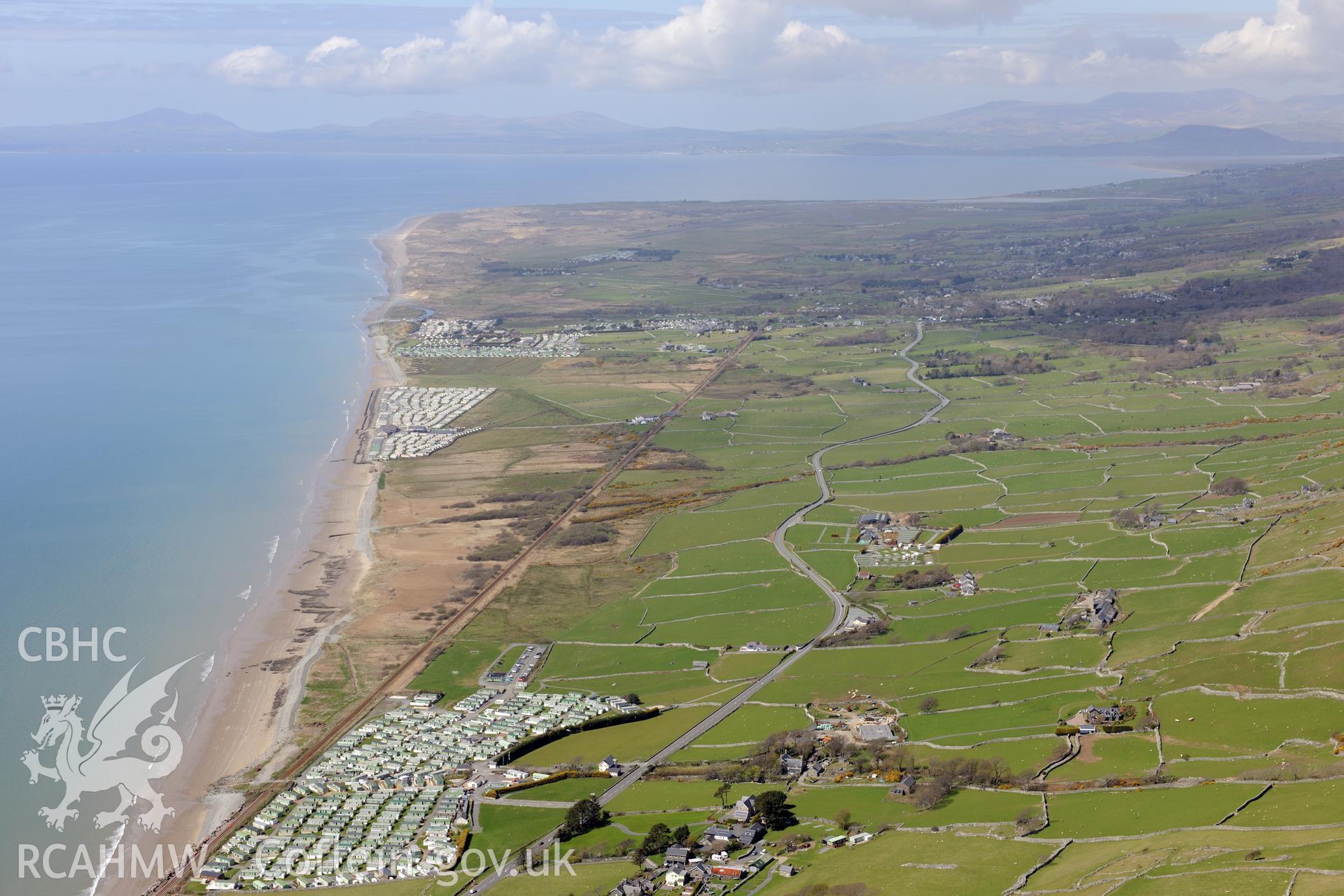 Peat deposits on the Llanaber coastline and Llanbedr airfield. Oblique aerial photograph taken during the Royal Commission?s programme of archaeological aerial reconnaissance by Toby Driver on 1st May 2013.