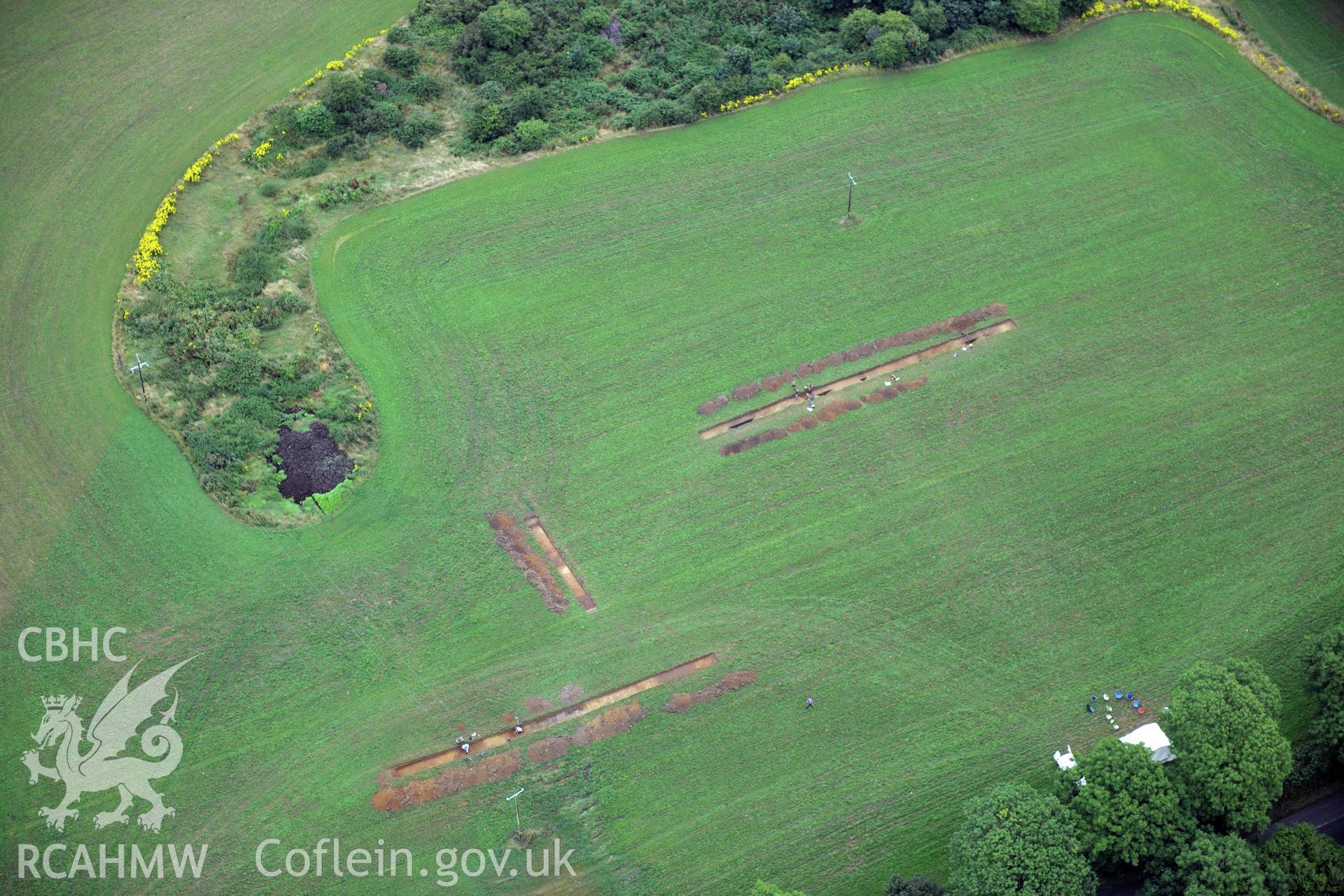 Wiston Roman Fort with excavations by Dyfed Archaeological Trust, north east of Haverfordwest. Oblique aerial photograph taken during the Royal Commission?s programme of archaeological aerial reconnaissance by Toby Driver on 1st August 2013.