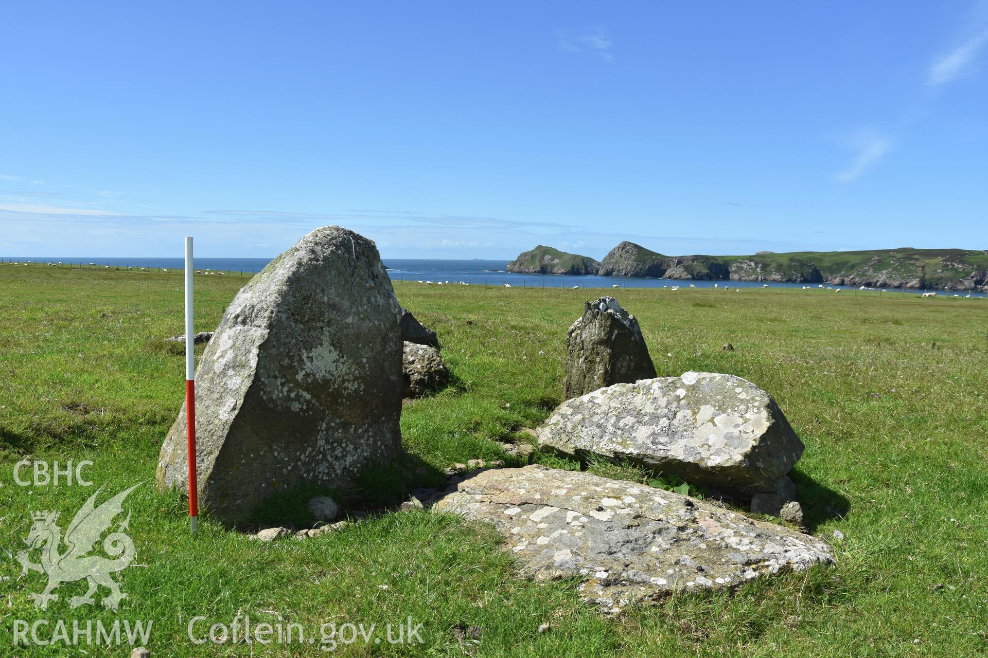 Lower Treginnis chambered tomb. View looking south-west. 1m scale. Investigator?s photographic survey for the CHERISH Project. ? Crown: CHERISH PROJECT 2019. Produced with EU funds through the Ireland Wales Co-operation Programme 2014-2020. All material made freely available through the Open Government Licence.