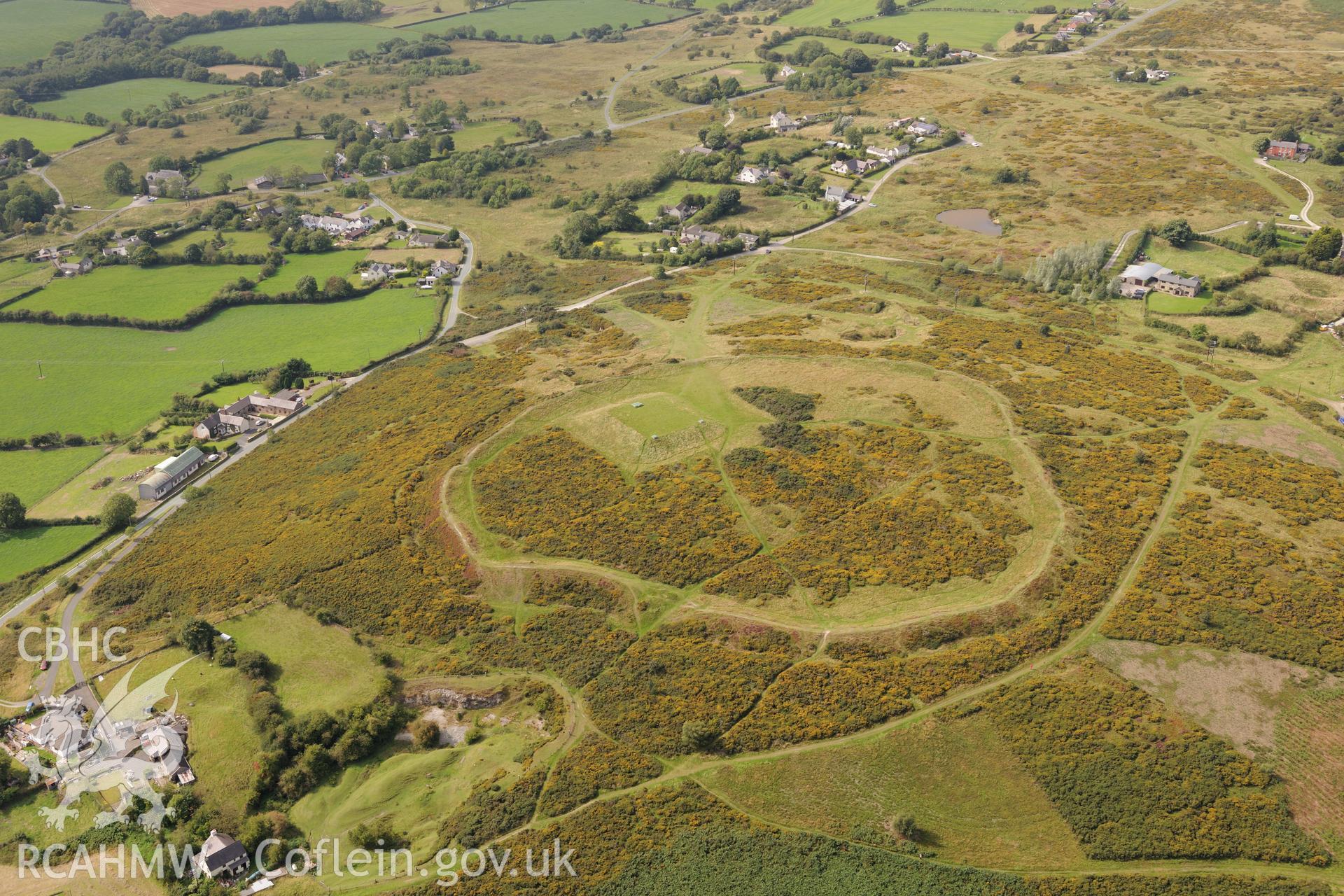 Moel-y-Gaer camp or hill top enclosure, Halkyn. Oblique aerial photograph taken during the Royal Commission's programme of archaeological aerial reconnaissance by Toby Driver on 11th September 2015.