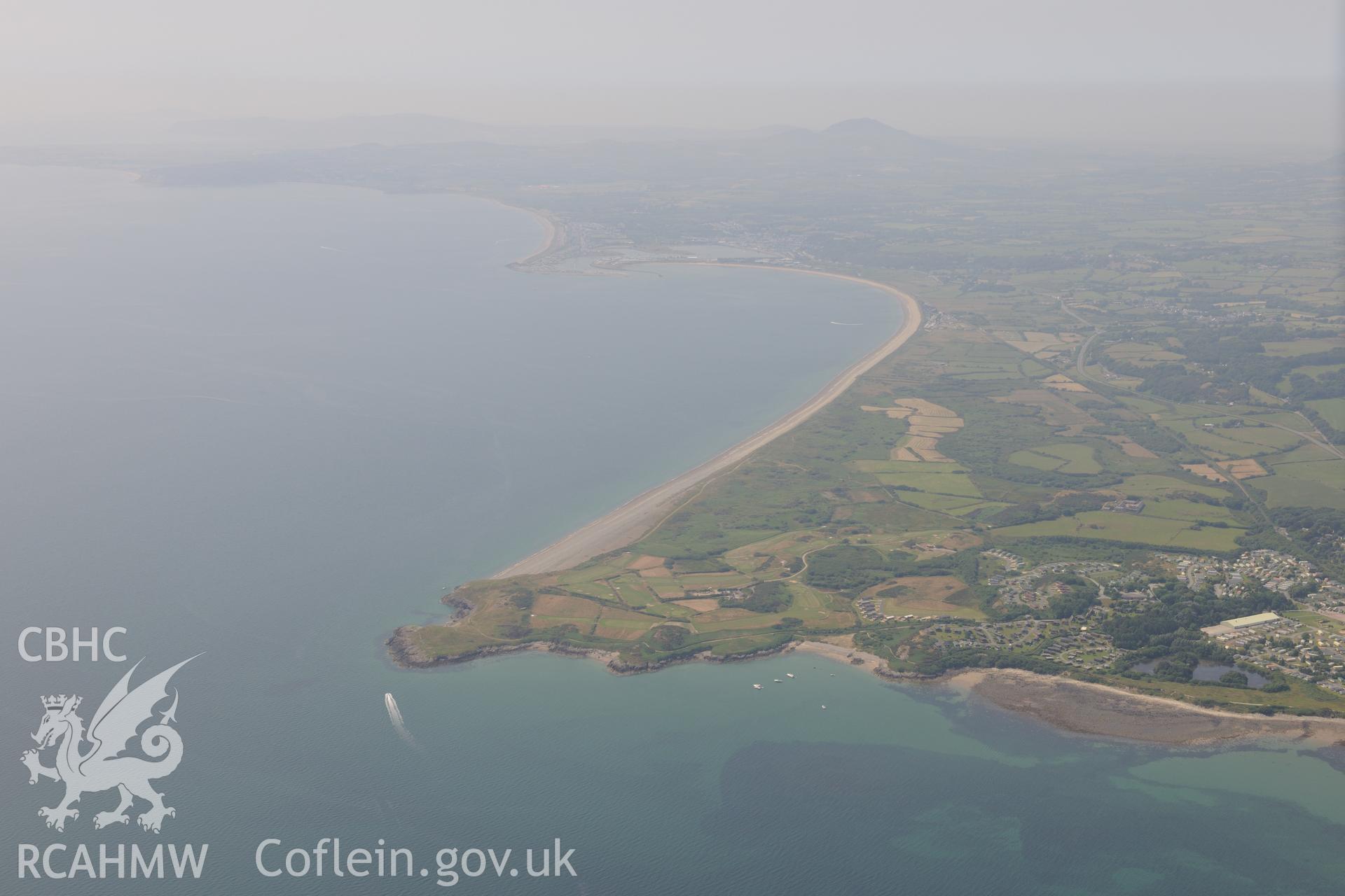 Hafan y Mor Holiday Park, Cerrig y Barcdy and Penychain Fish Traps, flint findspot and rifle range on Penychain Beach, Pwllheli. Oblique aerial photograph taken during RCAHMW?s programme of archaeological aerial reconnaissance by Toby Driver, 12/07/2013.