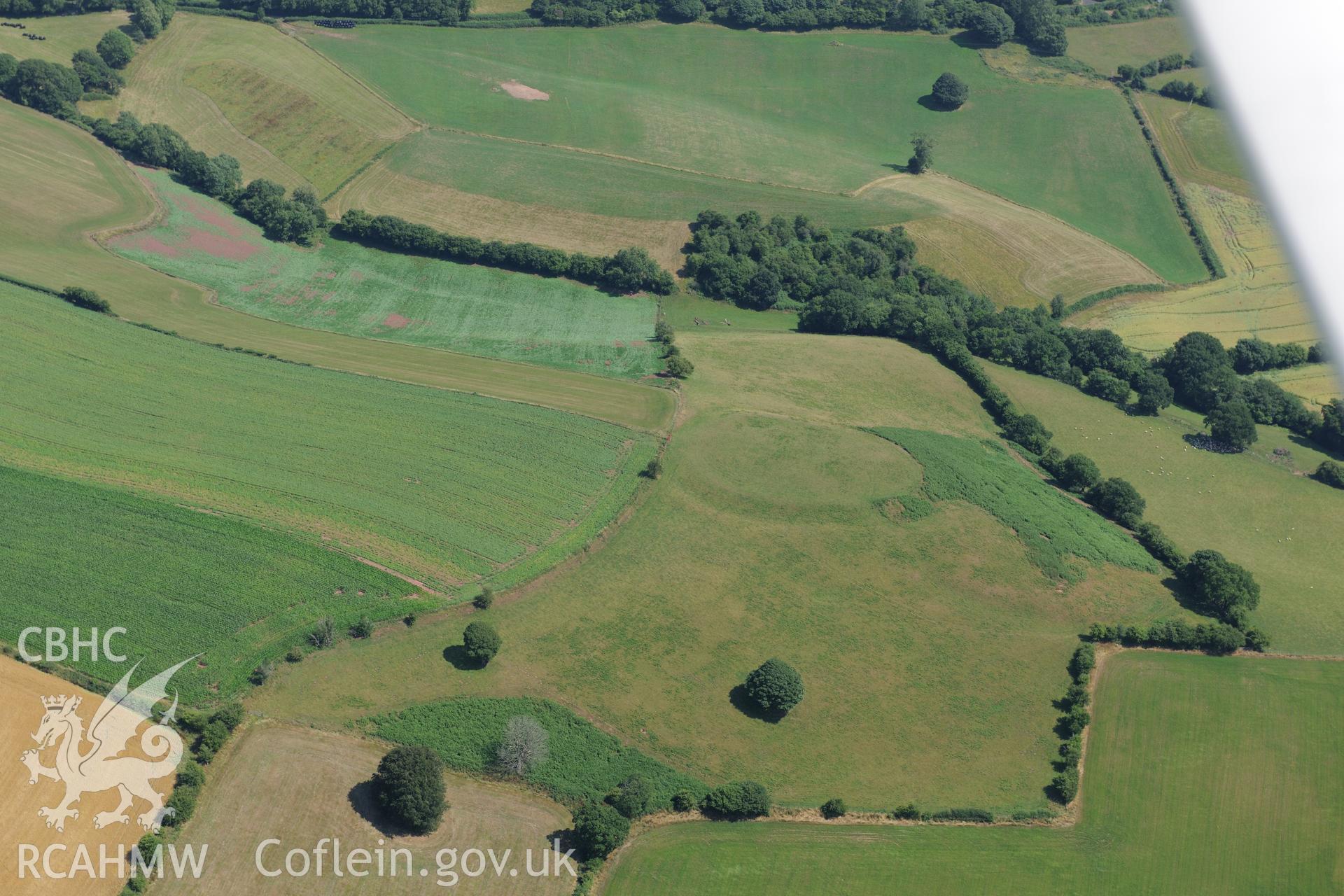 Ffynnon Gaer hillfort, near Trellech, south of Monmouth. Oblique aerial photograph taken during the Royal Commission?s programme of archaeological aerial reconnaissance by Toby Driver on 1st August 2013.