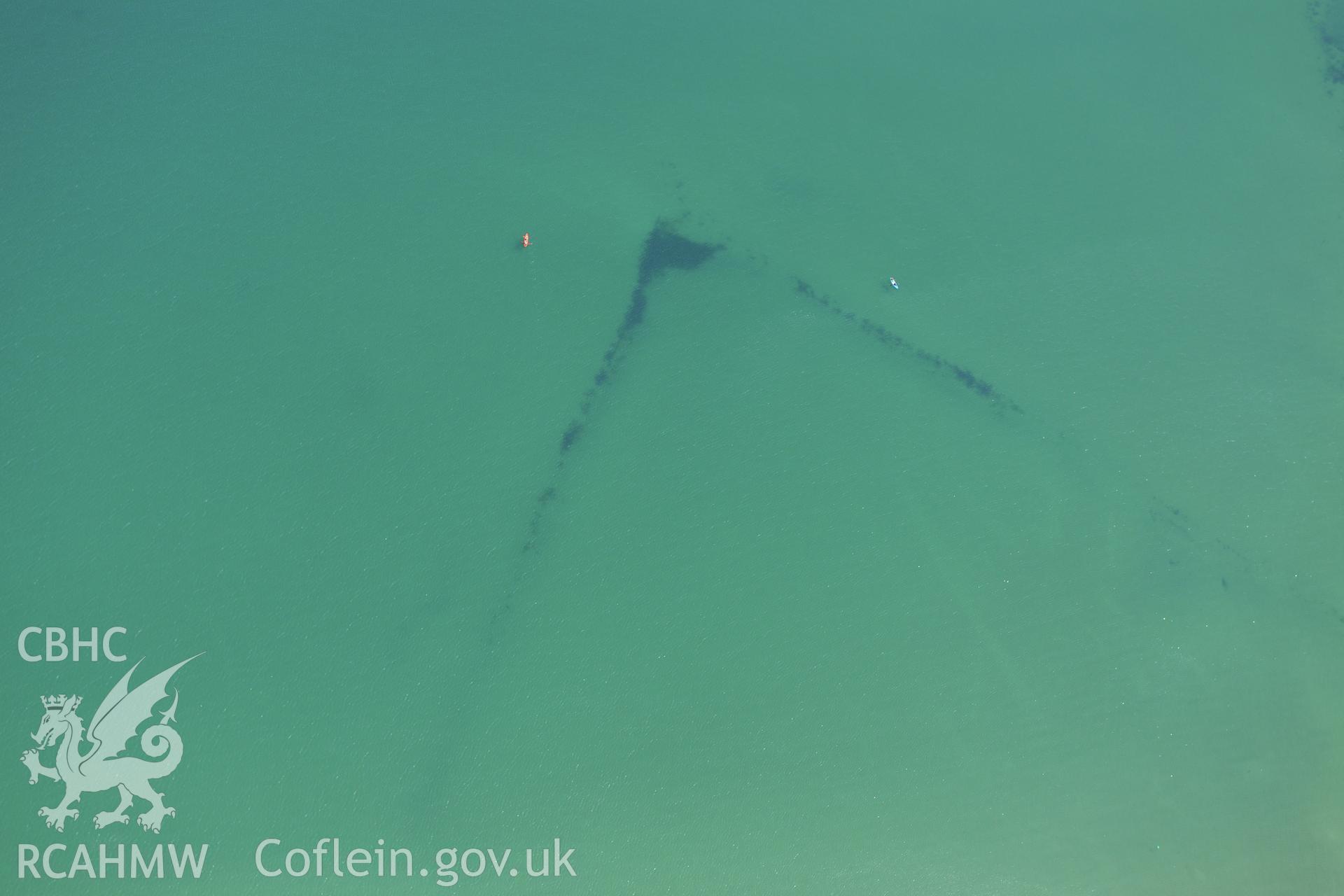 Oxwich Bay Fish Traps 1 and 2, on the southern coast of the Gower Peninsula. Oblique aerial photograph taken during the Royal Commission?s programme of archaeological aerial reconnaissance by Toby Driver on 16th July 2013.