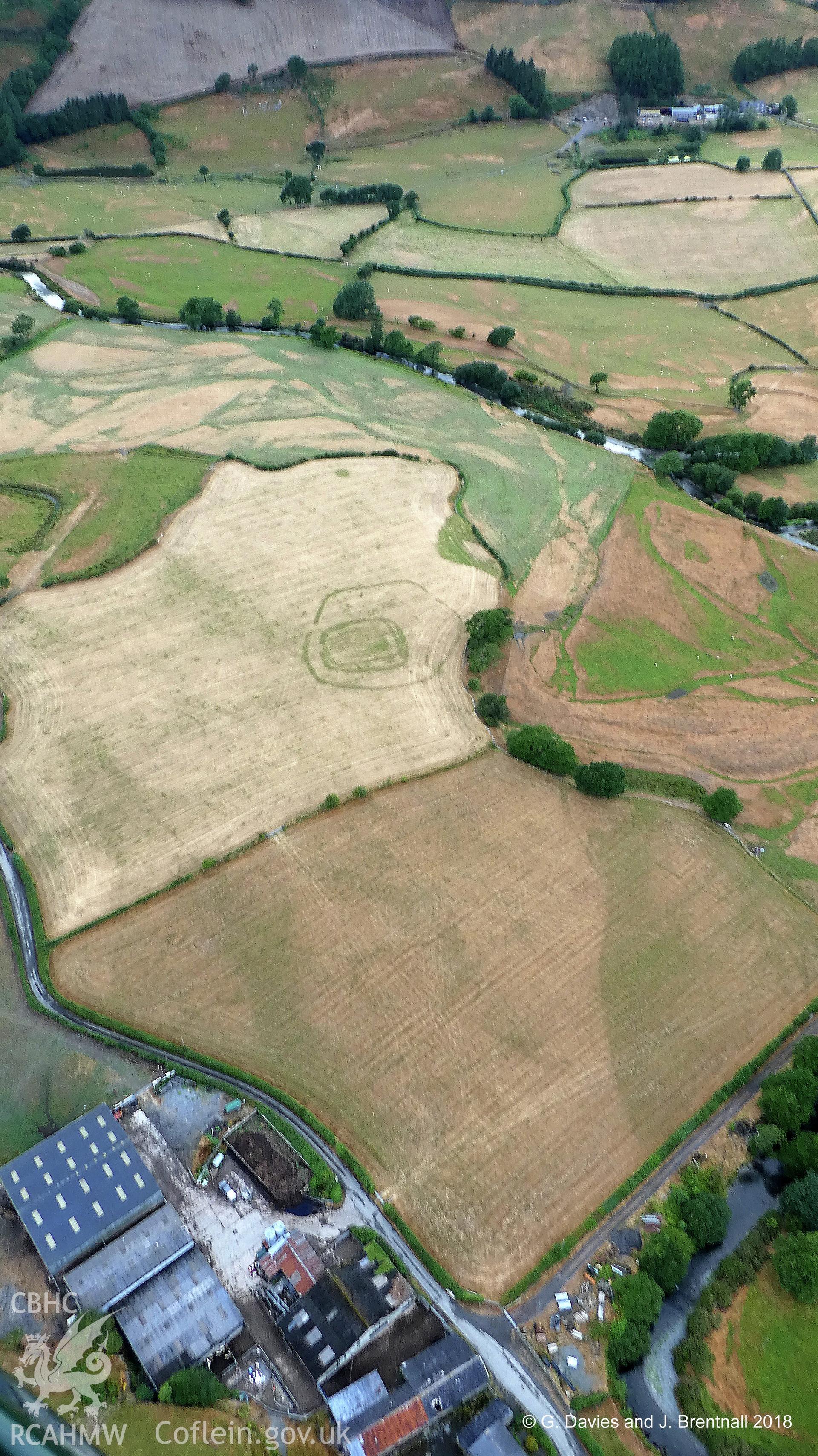 Modified aerial photograph showing crop marks of Ty'n-y-Bryn defended enclosure, Dyffryn Dysynni, north east of Tywyn. Photographed by Glyn Davies and Jonathan Brentnall under drought conditions on 16th July 2018.