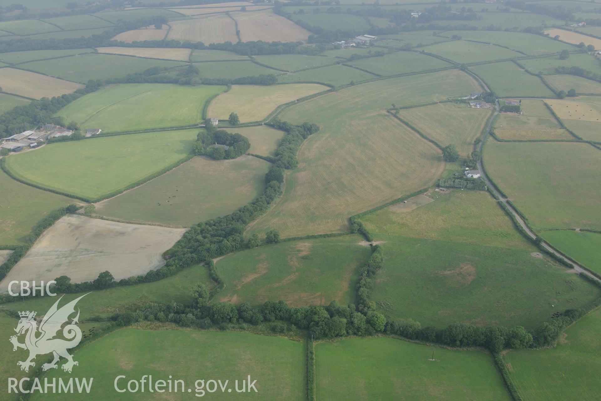 Royal Commission aerial photography of Llangan Church recorded during drought conditions on 22nd July 2013.